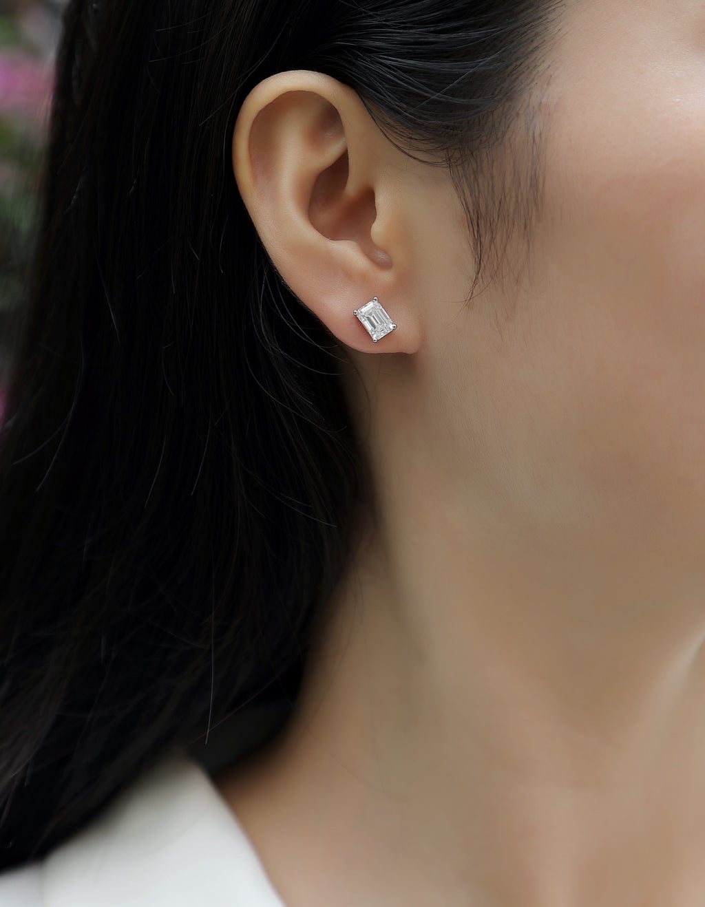 Enthralled Emerald-Cut Moissanite Stud Earrings in Sterling Silver
