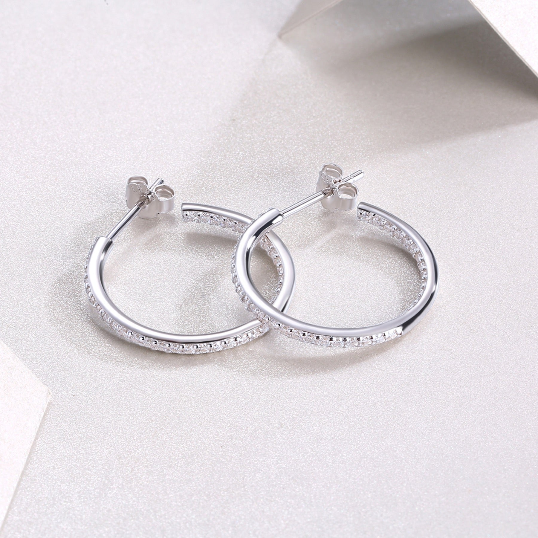 Ribbon Moissanite Hoop Earrings in Sterling Silver