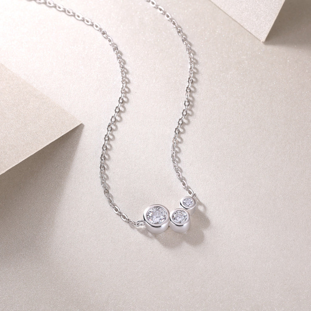Dewfall Moissanite Three-Stone Necklace in Sterling Silver