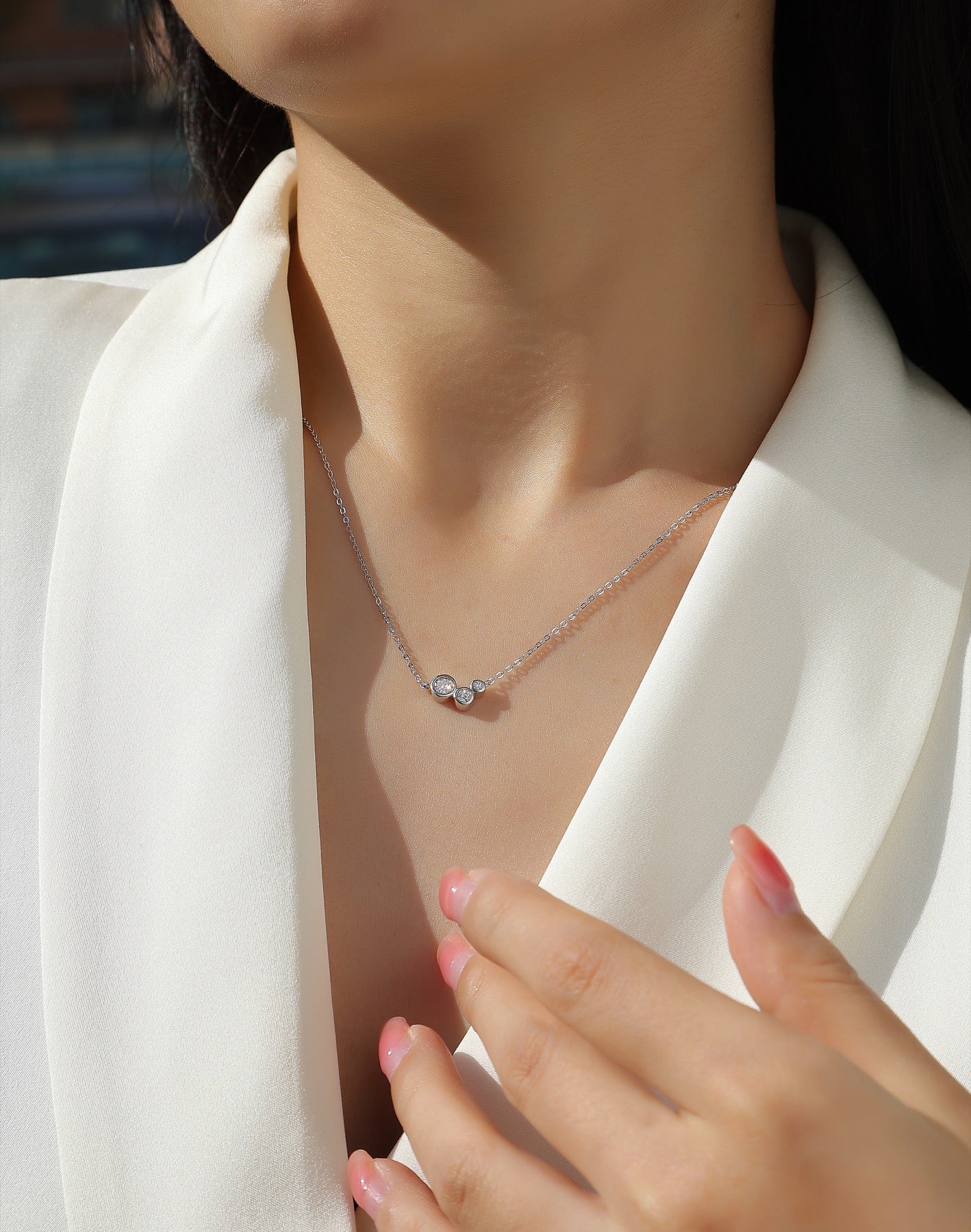 Dewfall Moissanite Three-Stone Necklace in Sterling Silver