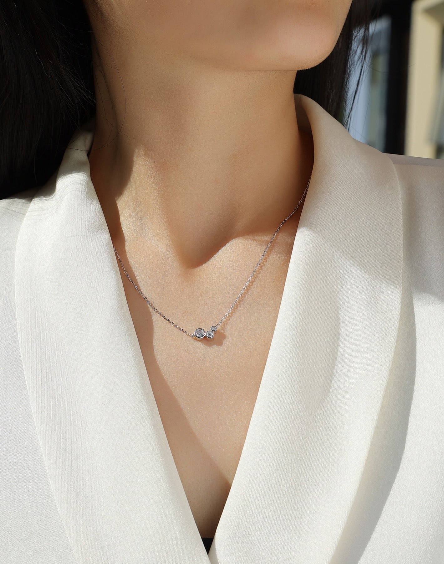 Dewfall Moissanite Three-Stone Necklace in Sterling Silver