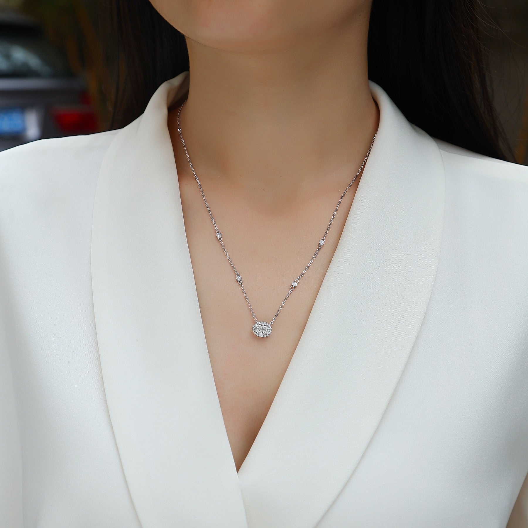 Midsummer Oval-Cut Moissanite Bezel Pendant Necklace in Sterling Silver