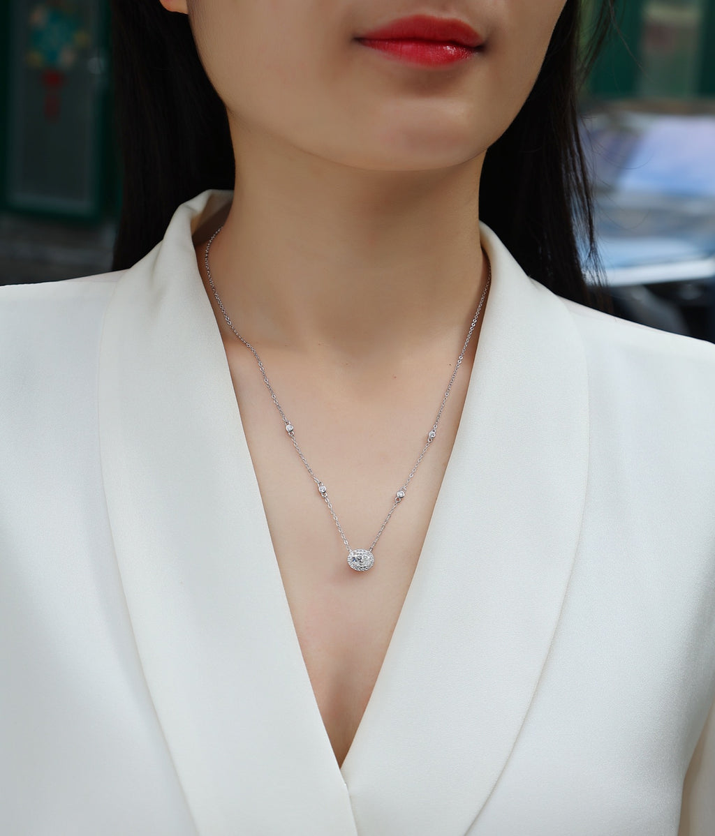 Midsummer Oval-Cut Moissanite Bezel Pendant Necklace in Sterling Silver