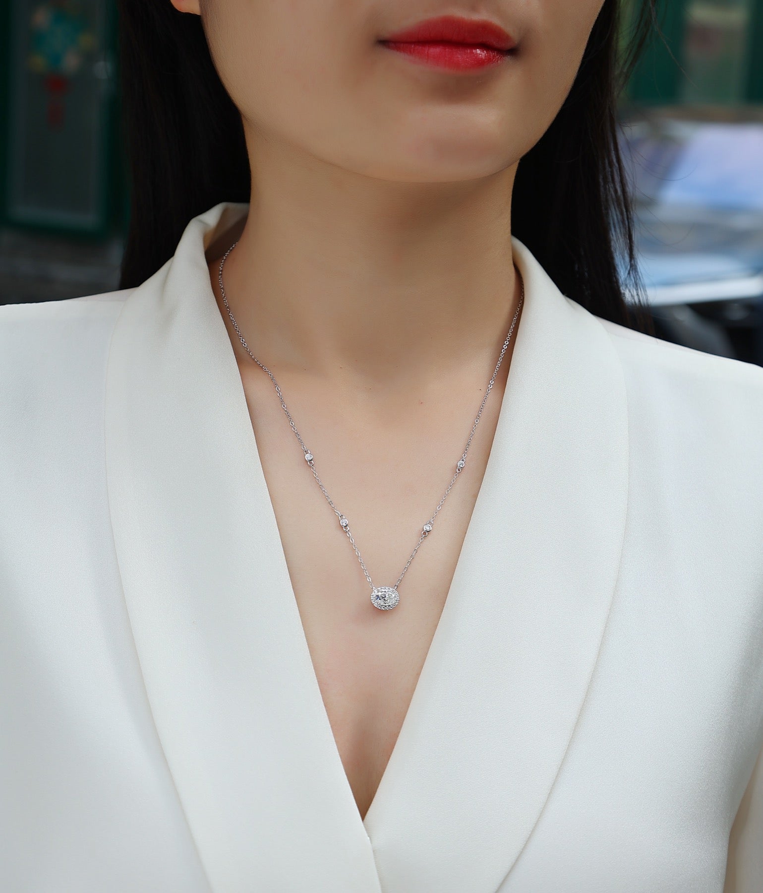 Midsummer Oval-Cut Moissanite Bezel Pendant Necklace in Sterling Silver