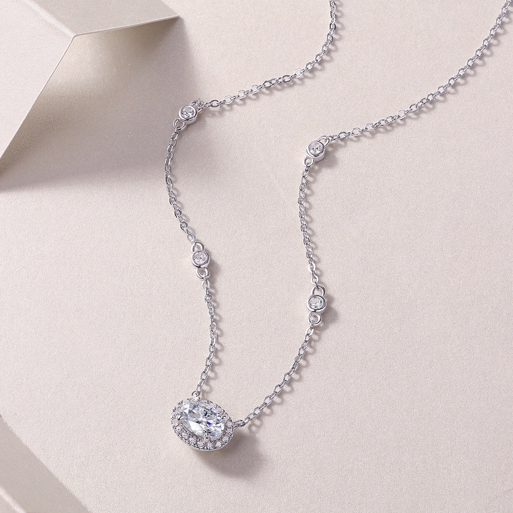Midsummer Oval-Cut Moissanite Bezel Pendant Necklace in Sterling Silver