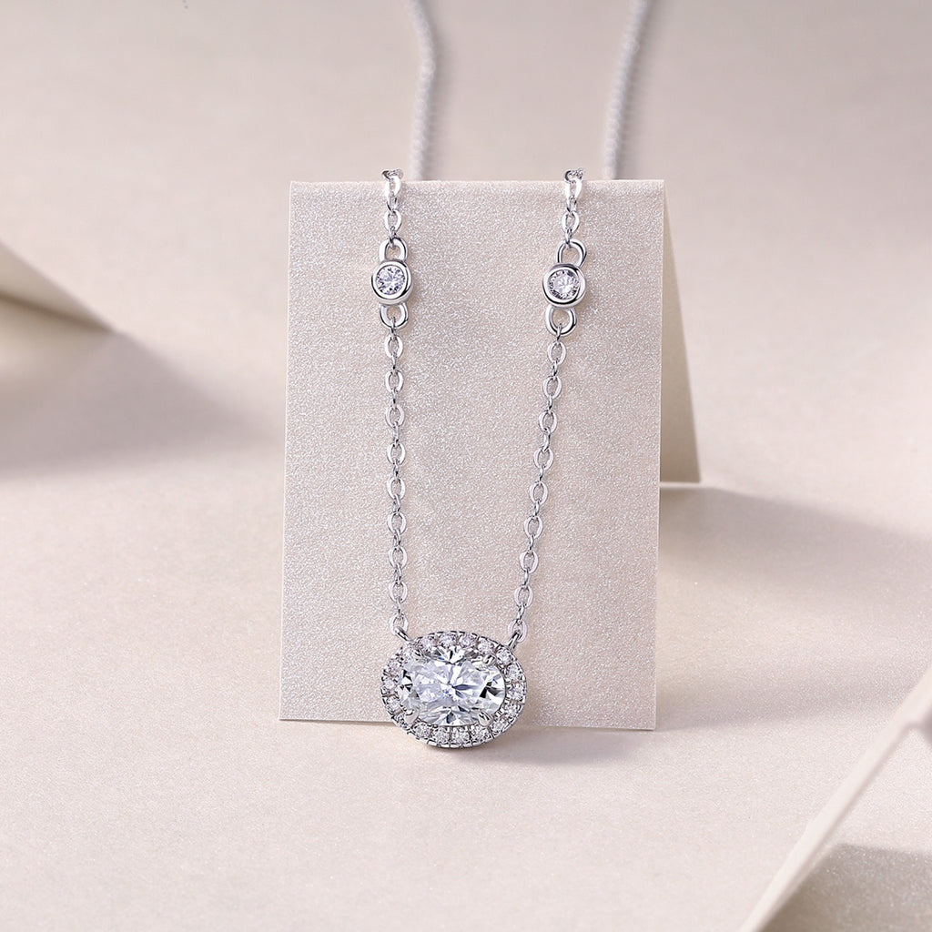 Midsummer Oval-Cut Moissanite Bezel Pendant Necklace in Sterling Silver