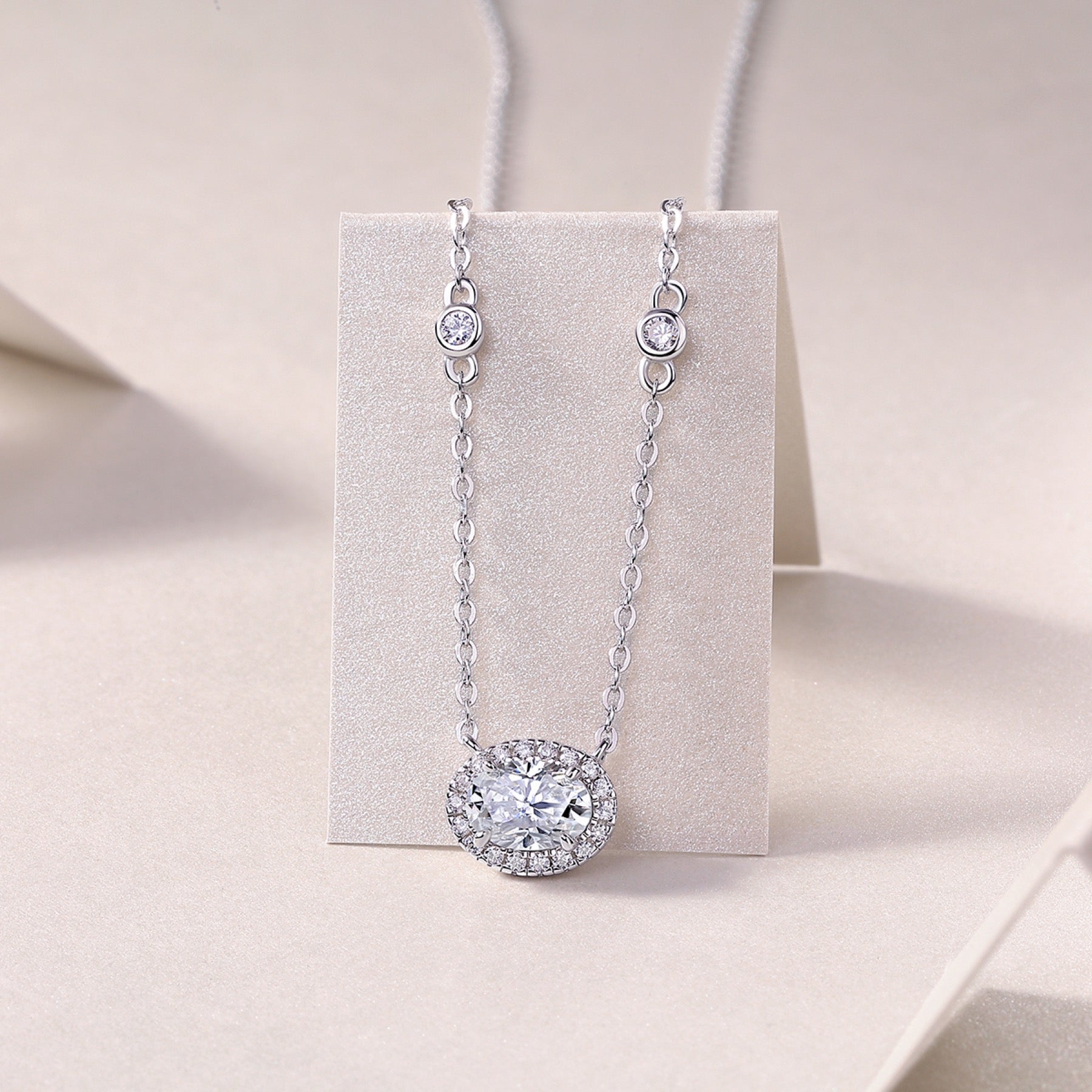 Midsummer Oval-Cut Moissanite Bezel Pendant Necklace in Sterling Silver