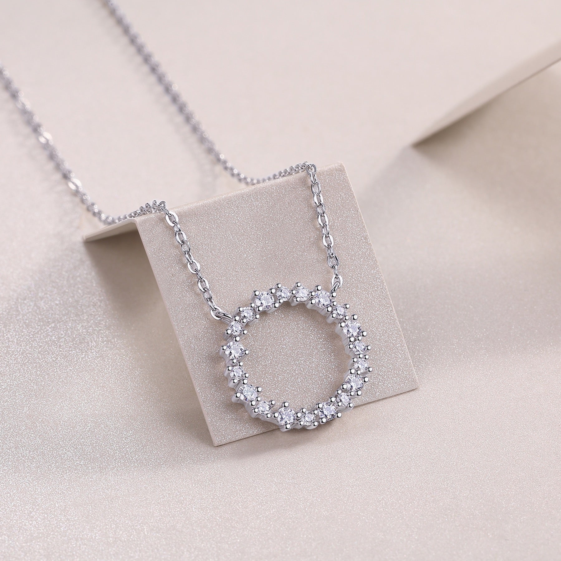 Ripple Moissanite Open Circle Necklace in Sterling Silver