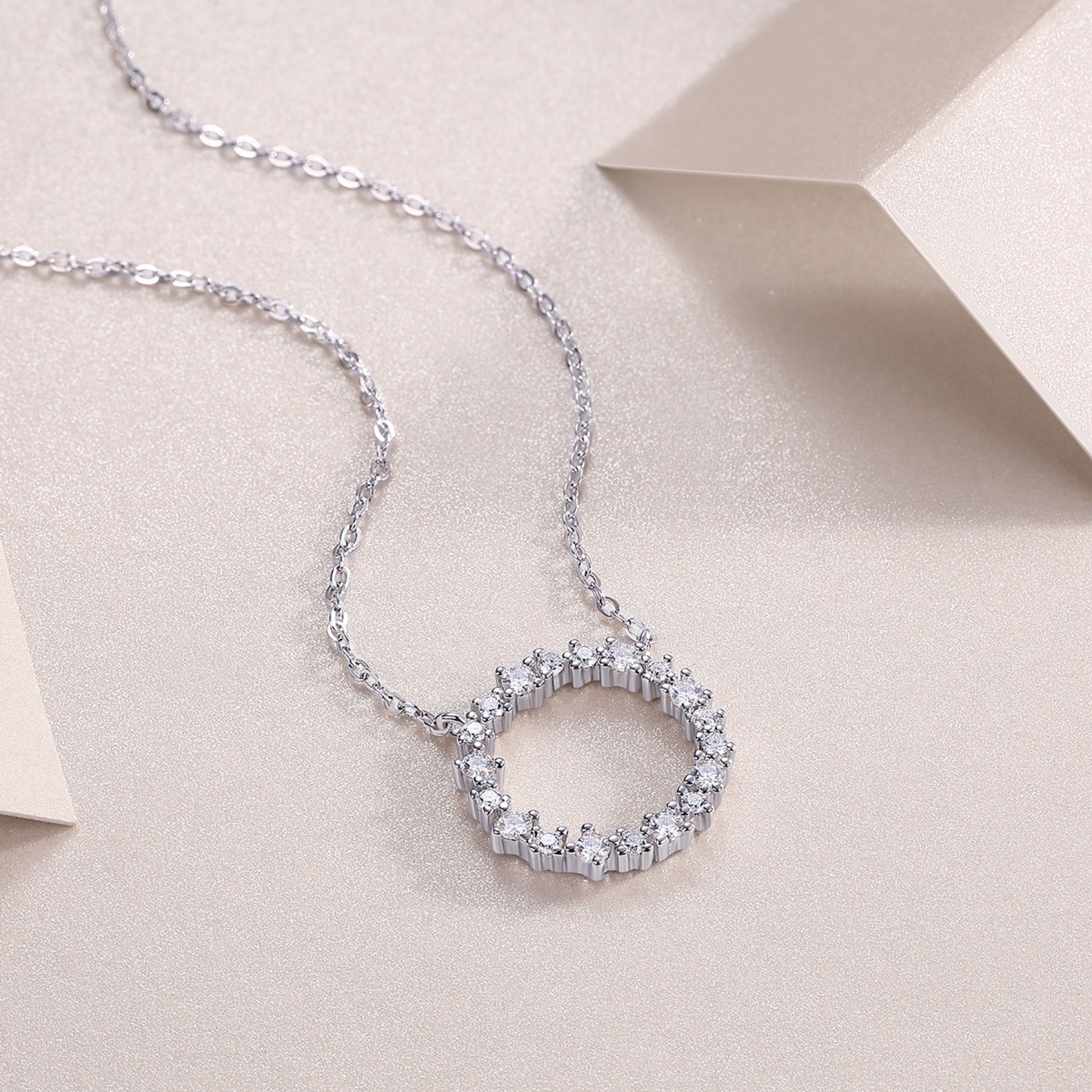 Ripple Moissanite Open Circle Necklace in Sterling Silver