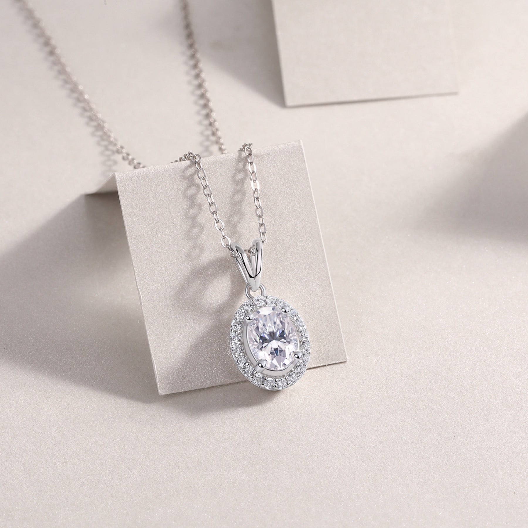 Verona Oval-Cut Moissanite Halo Pendant Necklace in Sterling Silver