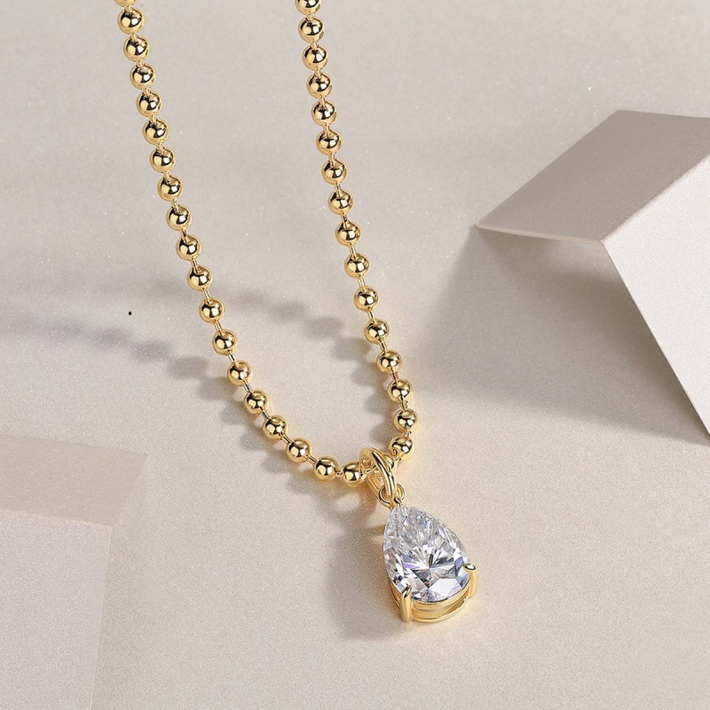 Wishlight Moissanite Pear Pendant Necklace in Gold-Tone Sterling Silver
