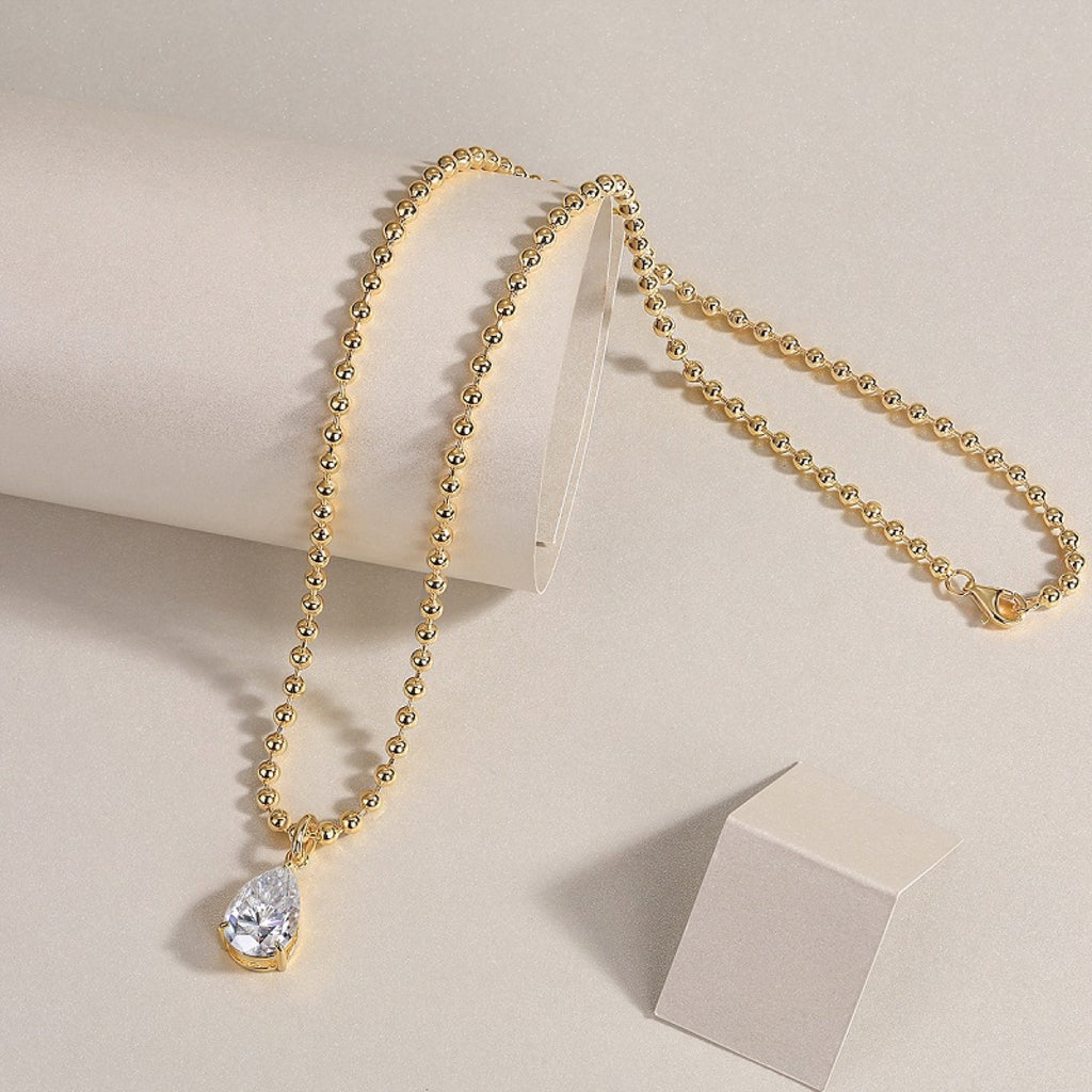 Wishlight Moissanite Pear Pendant Necklace in Gold-Tone Sterling Silver