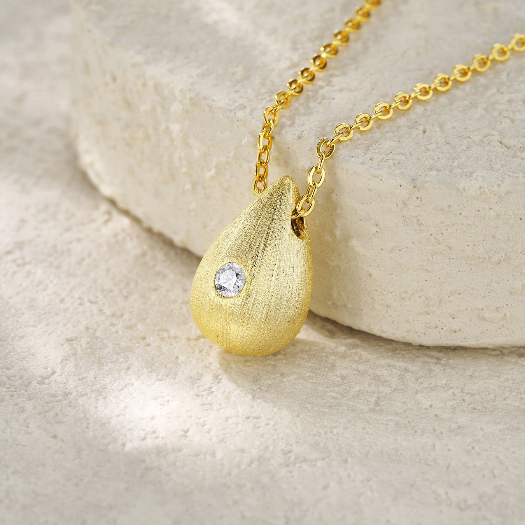 Reverie Moissanite Teardrop Pendant Necklace in Gold-Tone Sterling Silver