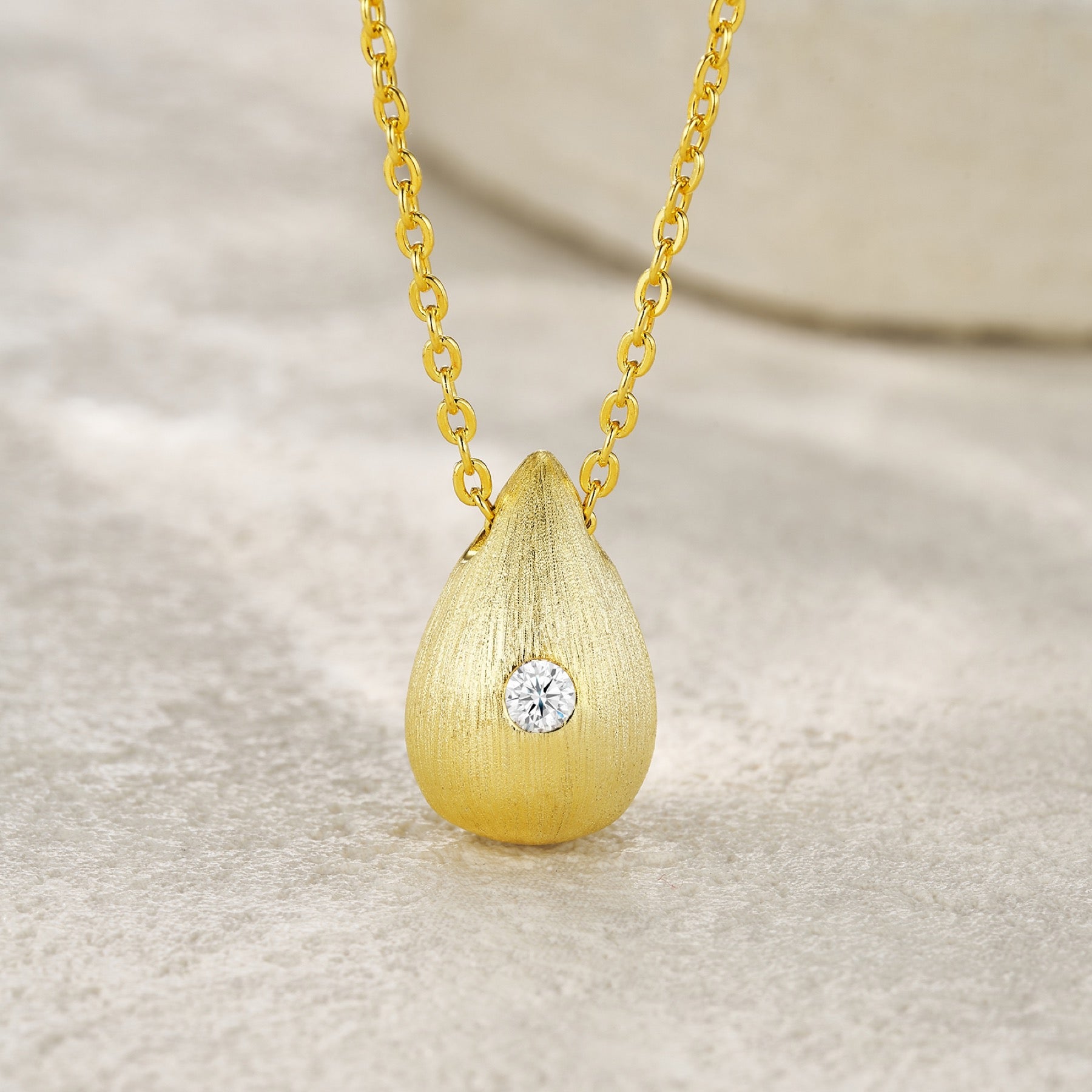 Reverie Moissanite Teardrop Pendant Necklace in Gold-Tone Sterling Silver