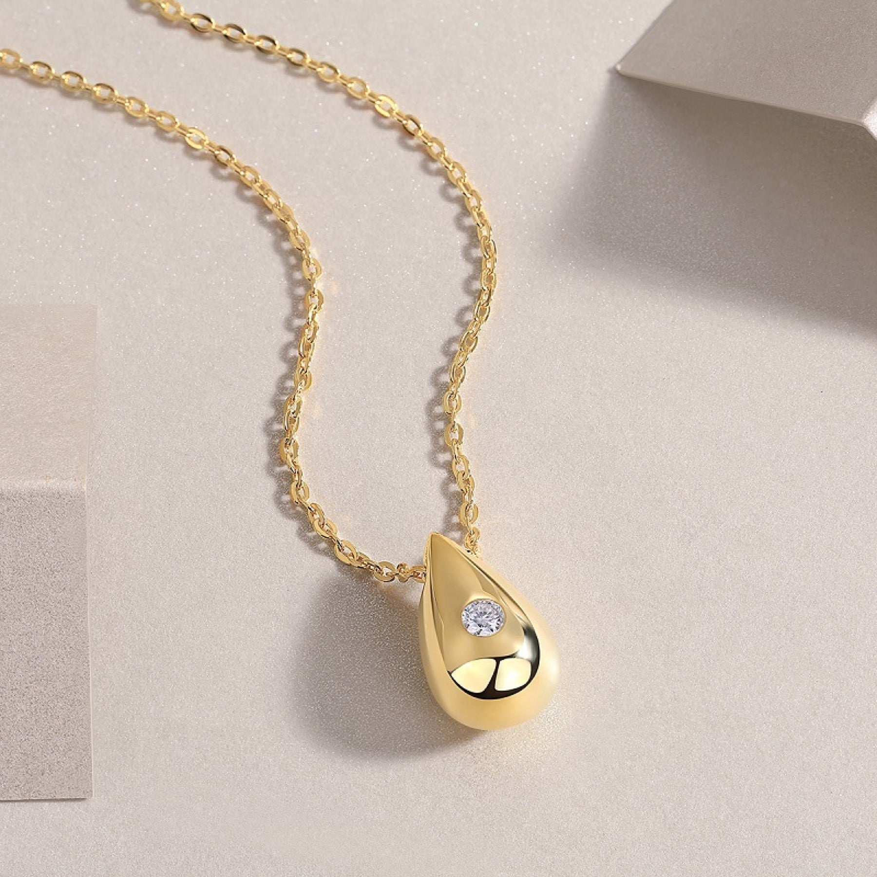 Reverie Moissanite Teardrop Pendant Necklace in Gold-Tone Sterling Silver