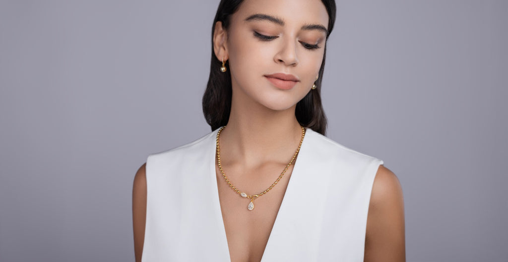 Twilight Moissanite Pear Pendant Necklace in Gold-Tone Sterling Silver