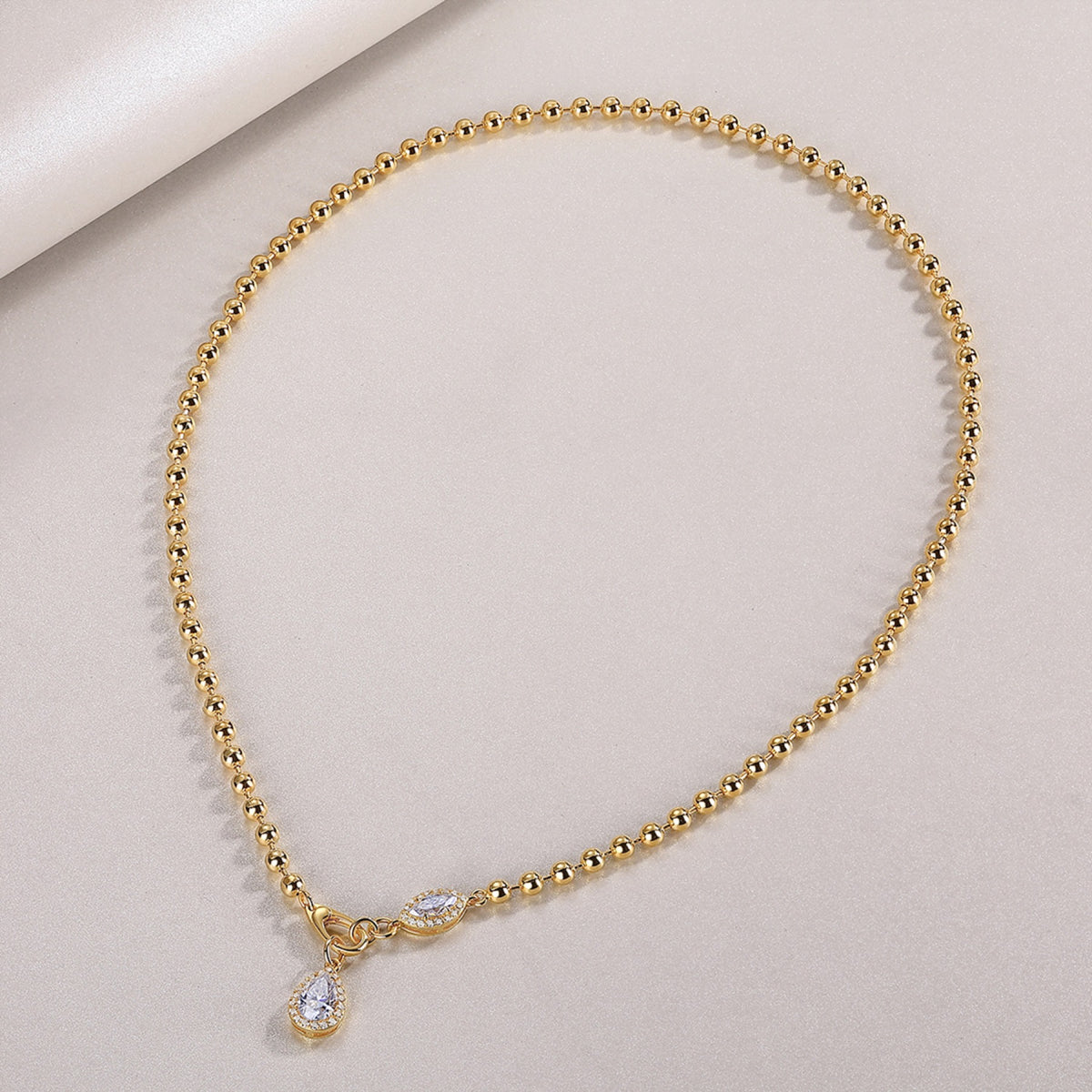 Twilight Moissanite Pear Pendant Necklace in Gold-Tone Sterling Silver