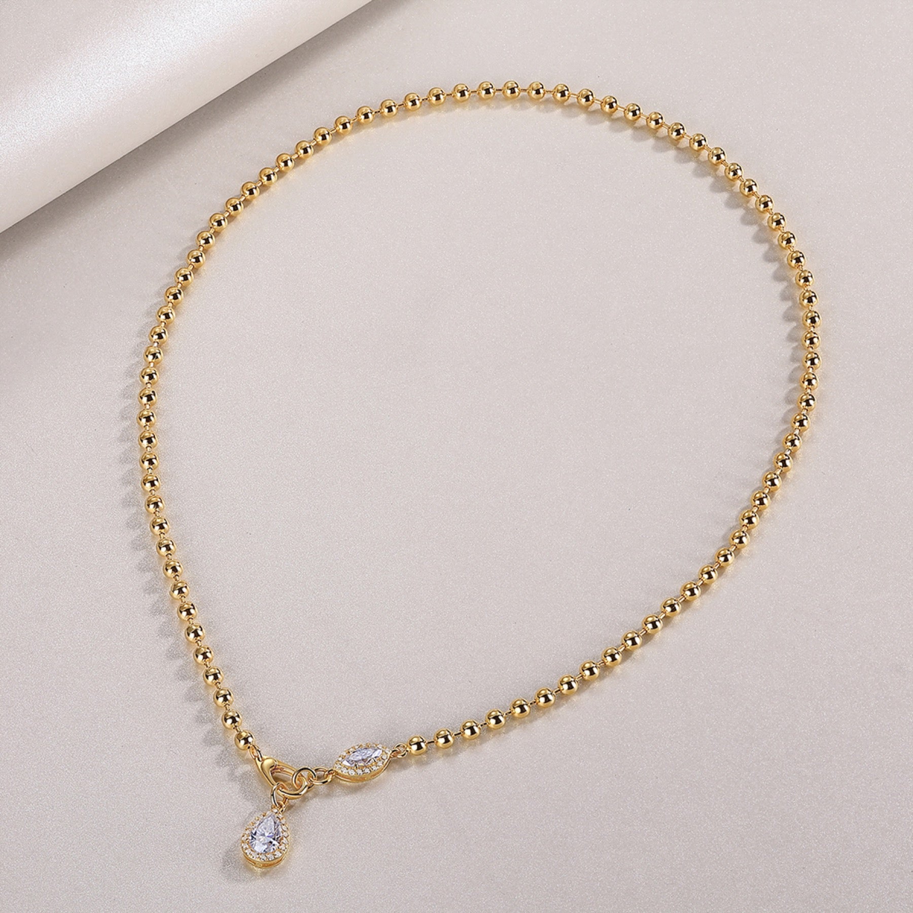 Twilight Moissanite Pear Pendant Necklace in Gold-Tone Sterling Silver