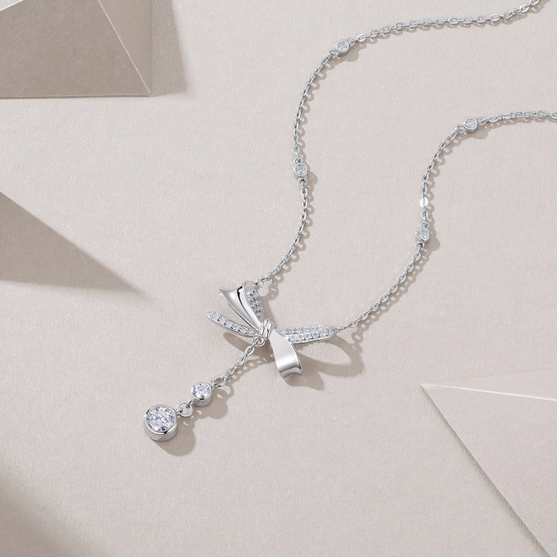 Fleur Moissanite Bow Lariat Necklace in Sterling Silver