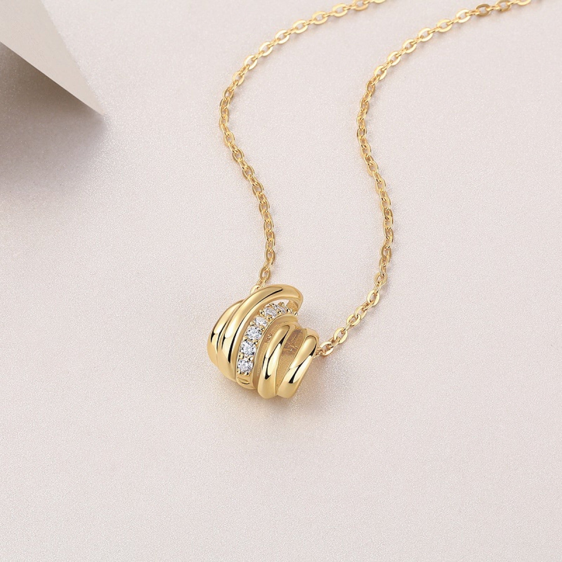 Nexus Moissanite Knot Pendant Necklace in Gold-Tone Sterling Silver