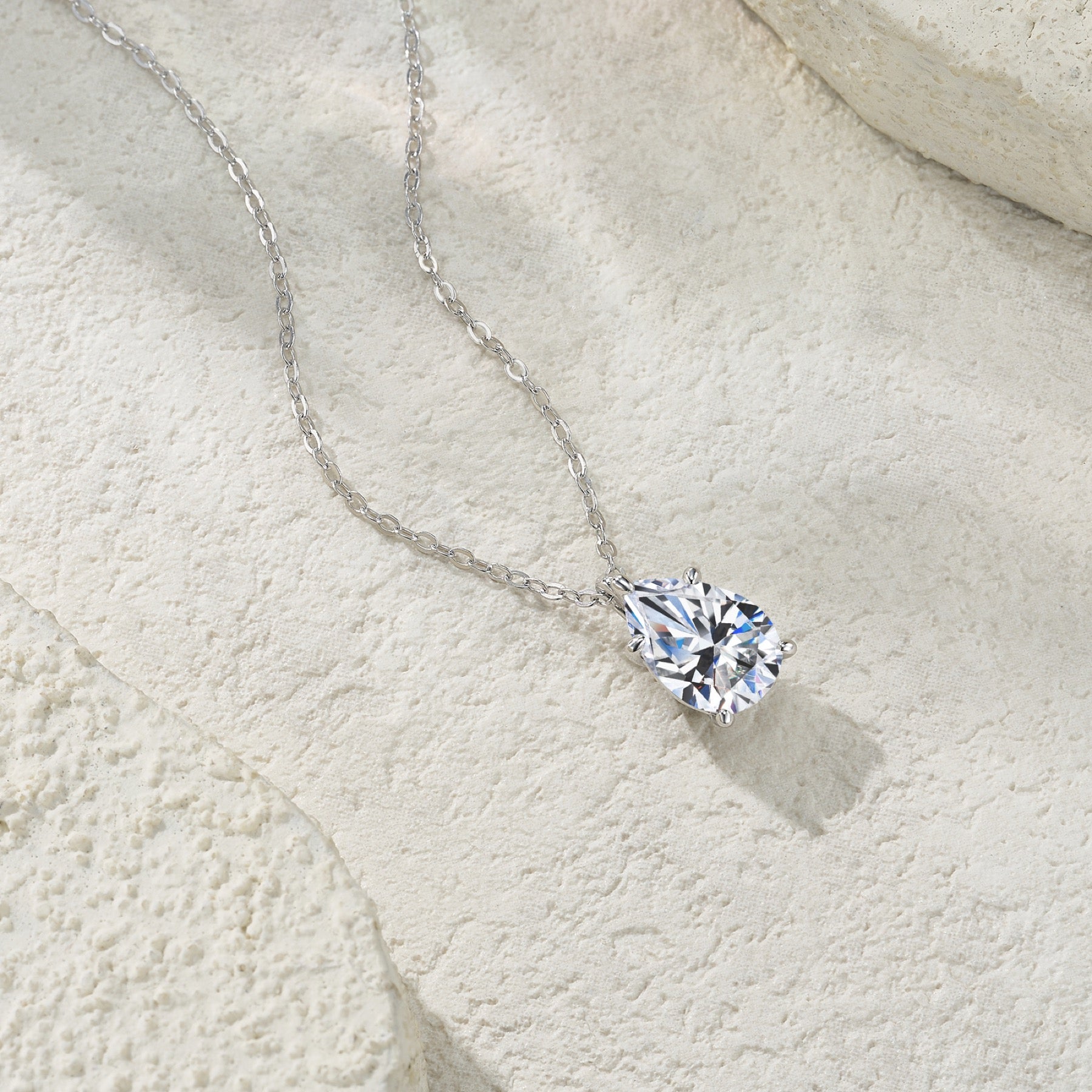 Whirl Moissanite Solitaire Pendant Necklace in Sterling Silver