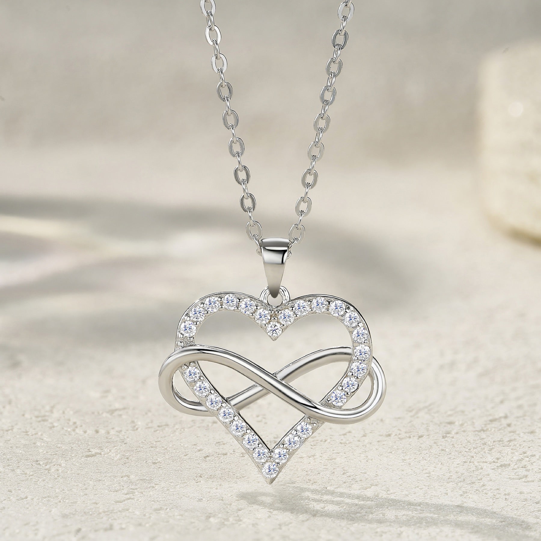 Infinity Moissanite Infinity Heart Necklace in Sterling Silver