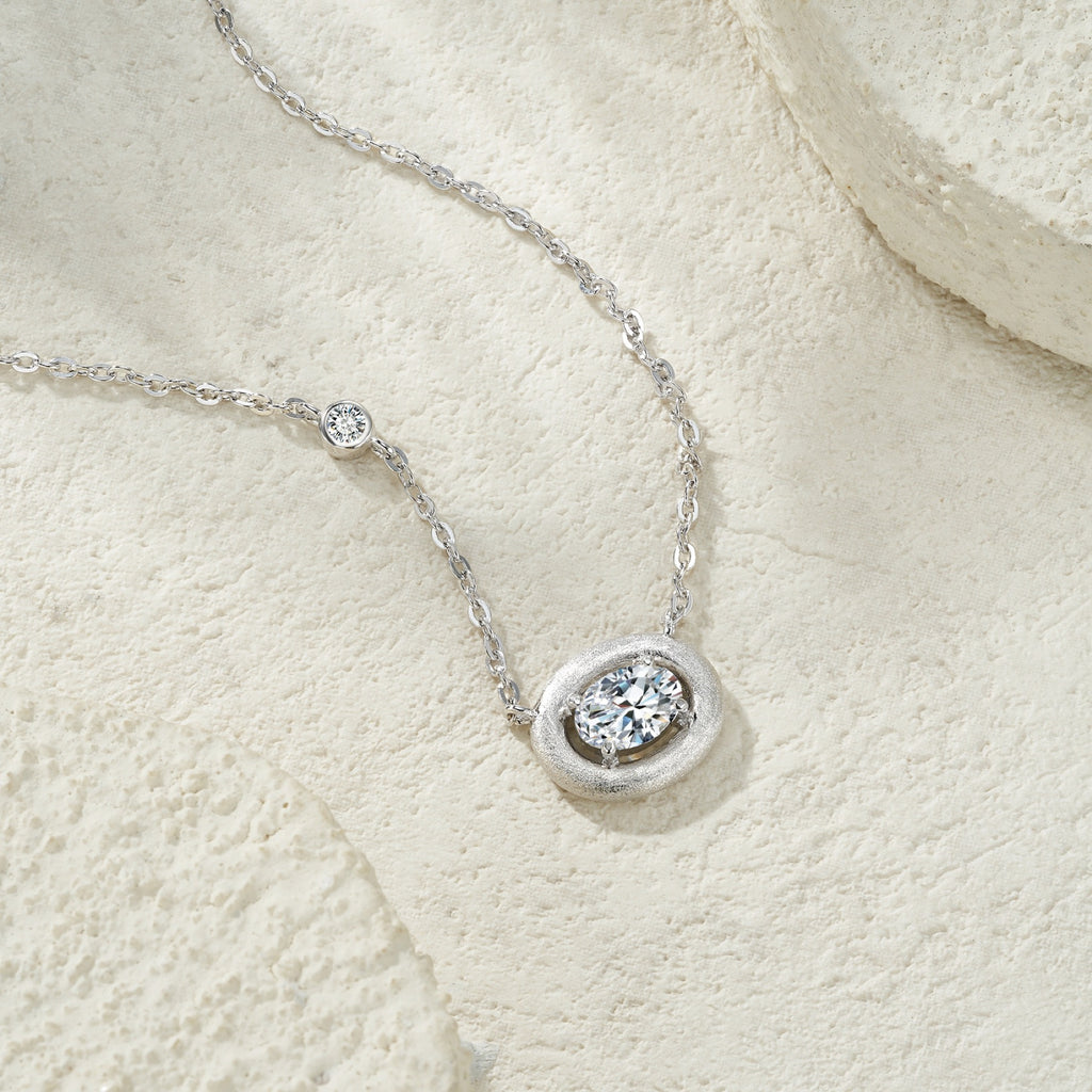 Pebble Moissanite Oval Bezel Necklace in Sterling Silver