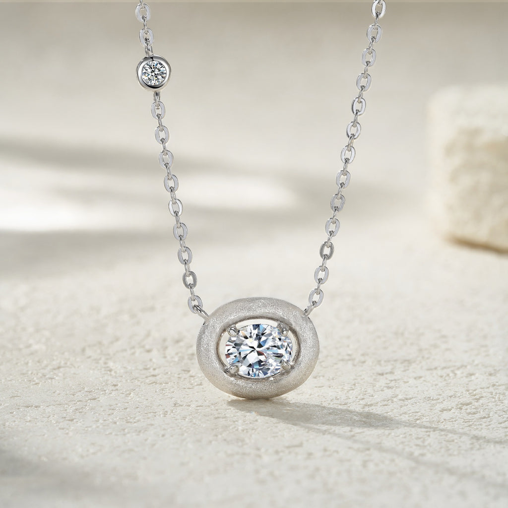 Pebble Moissanite Oval Bezel Necklace in Sterling Silver