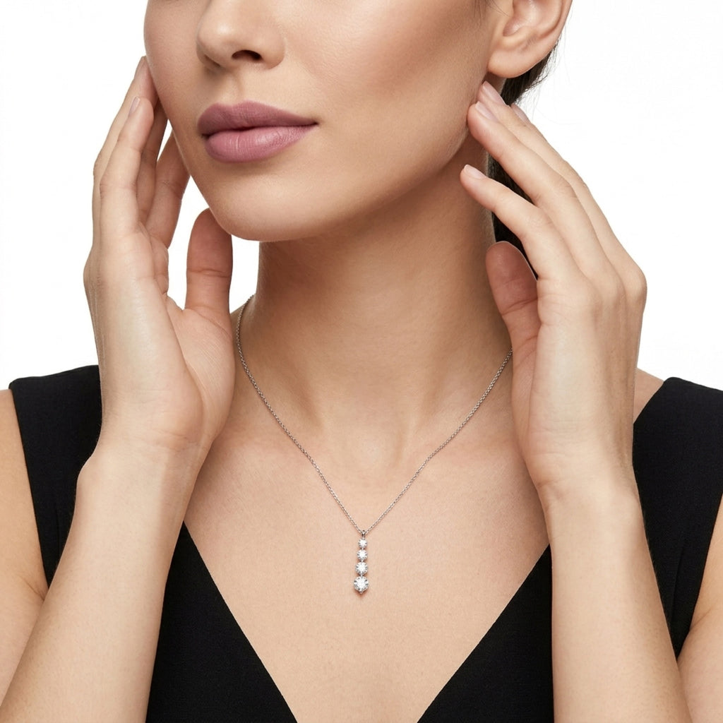 Descent Moissanite Three-Stone Drop Necklace in Sterling Silver