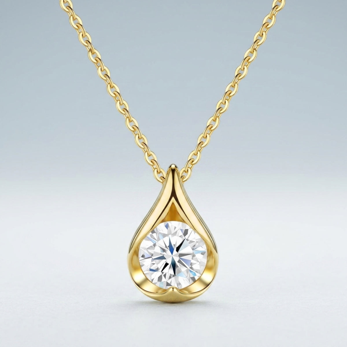 Sole 2 Carat Moissanite Teardrop Pendant Necklace in Gold-Tone Sterling Silver
