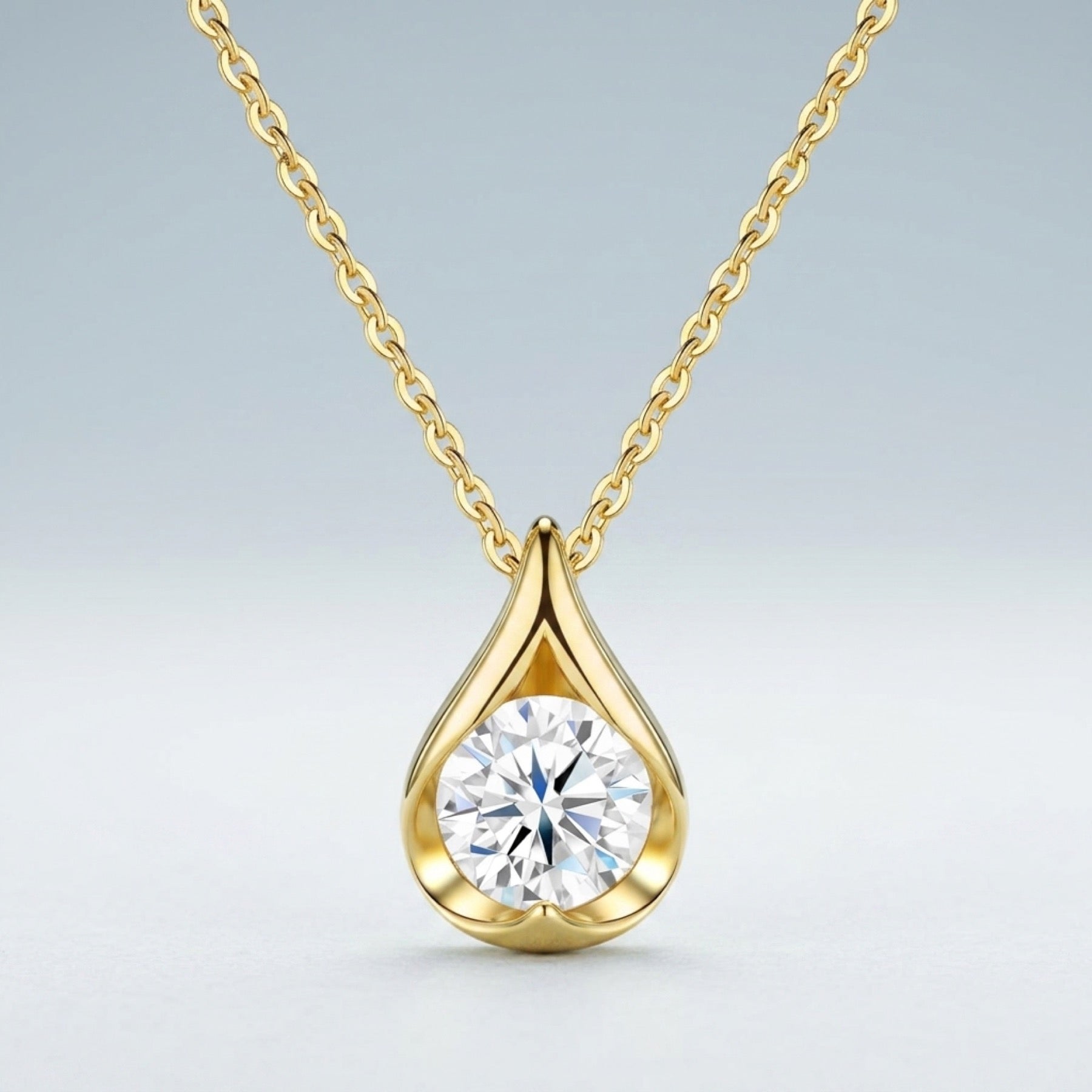 Sole 2 Carat Moissanite Teardrop Pendant Necklace in Gold-Tone Sterling Silver
