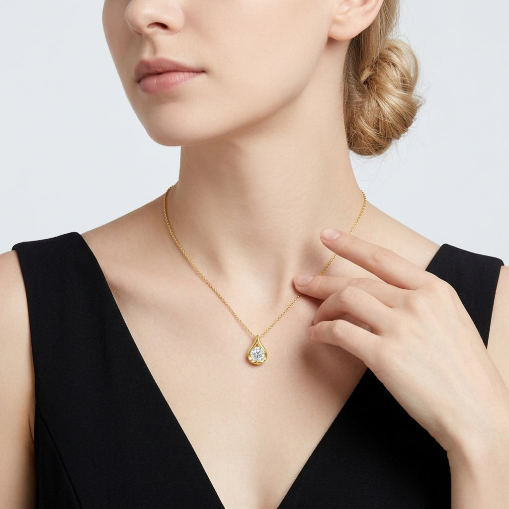 Sole 2 Carat Moissanite Teardrop Pendant Necklace in Gold-Tone Sterling Silver