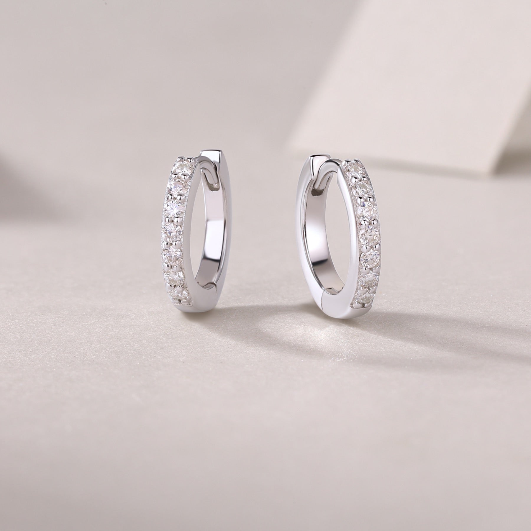 Resolute Moissanite Huggie Hoop Earrings in Sterling Silver