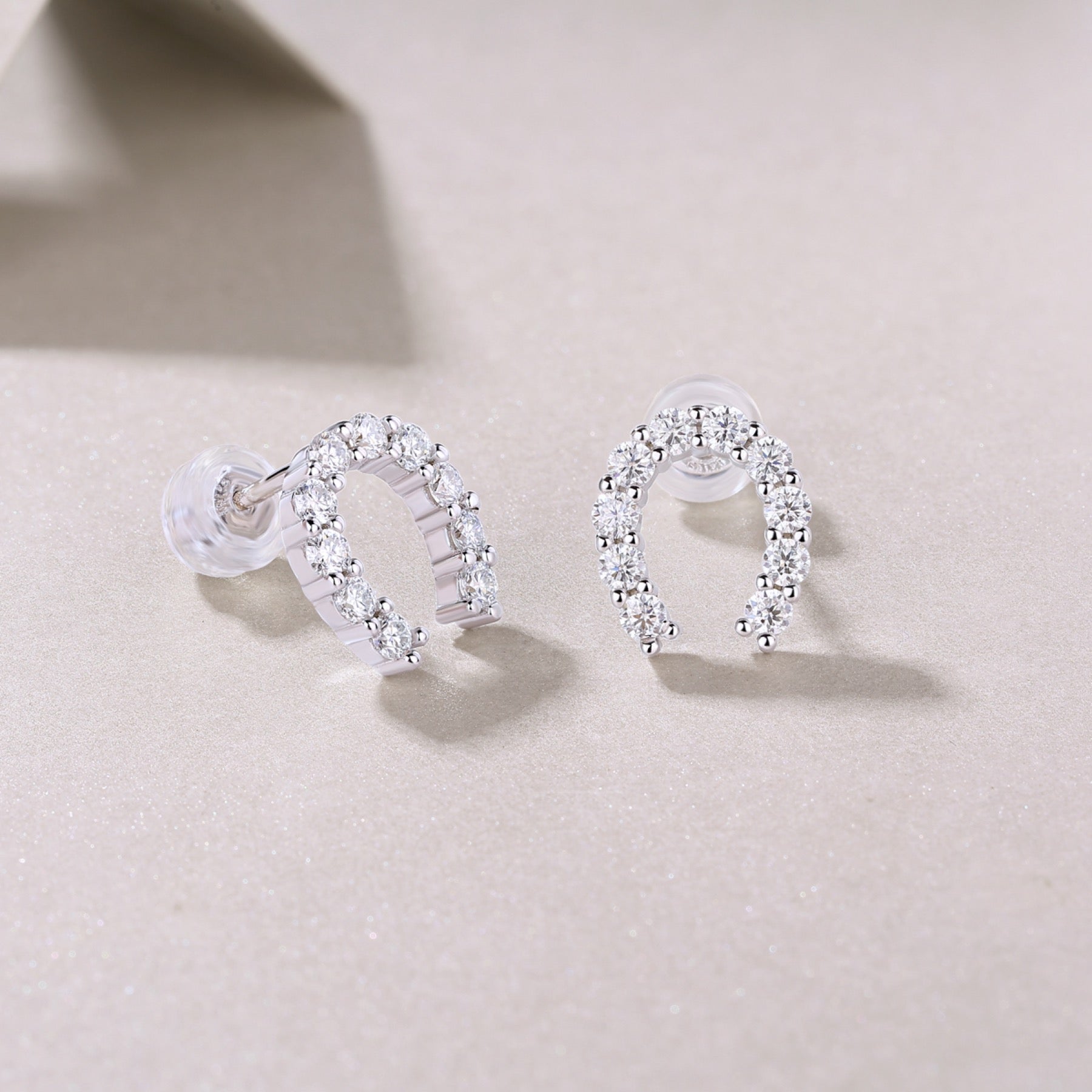 Charmed Moissanite Horseshoe Stud Earrings in Sterling Silver