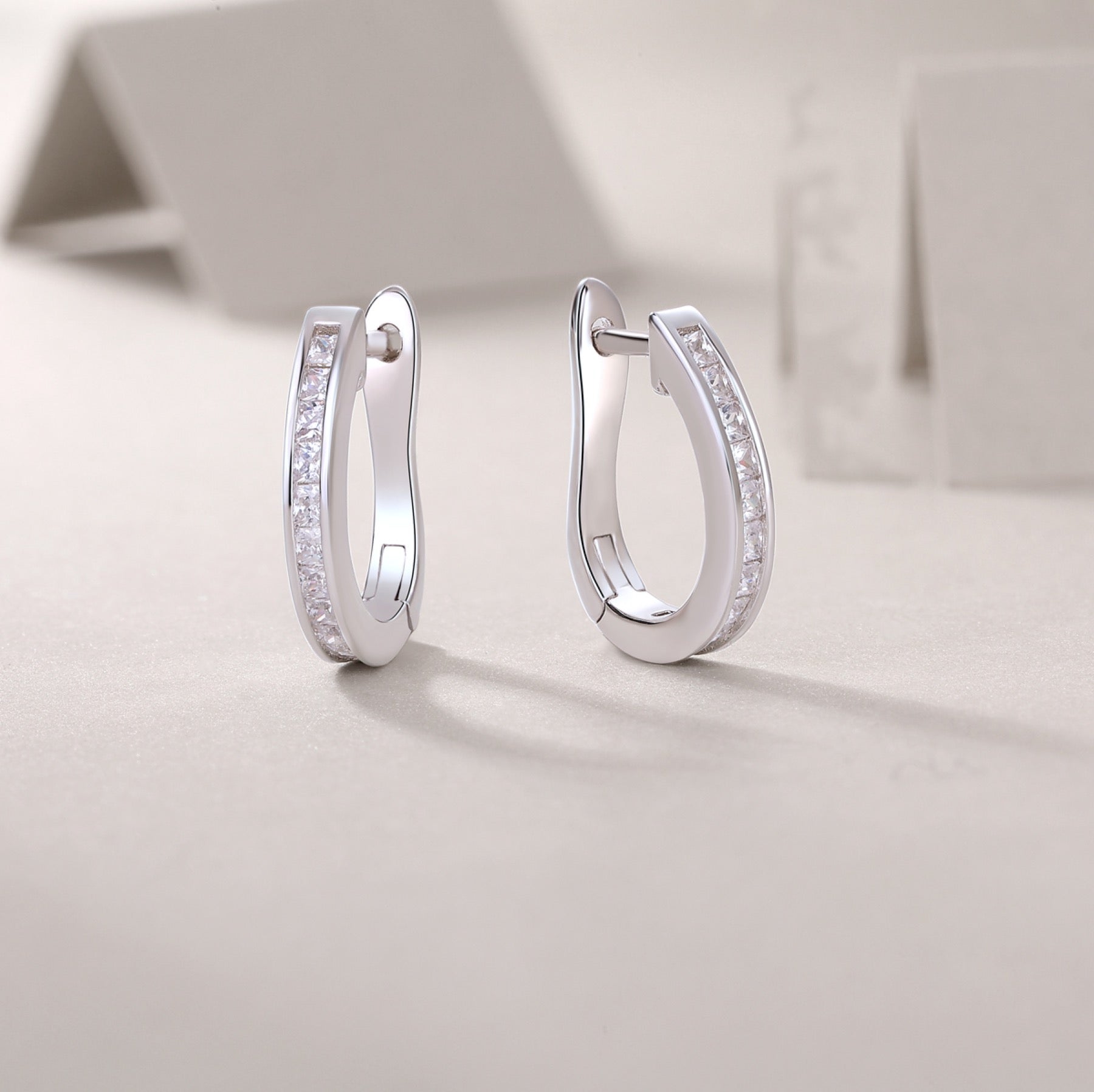 Arch Moissanite Baguette Huggie Hoop Earrings in Sterling Silver