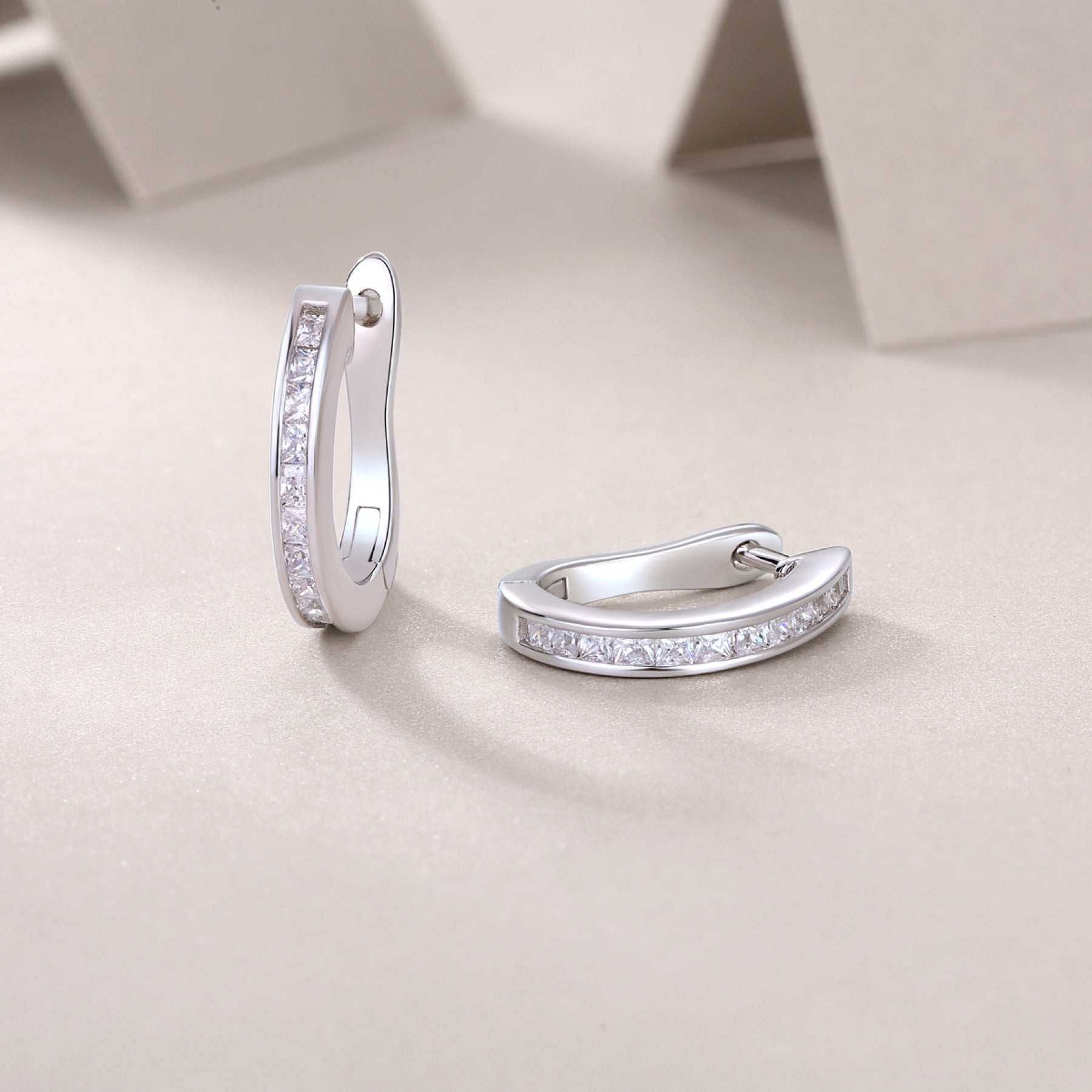 Arch Moissanite Baguette Huggie Hoop Earrings in Sterling Silver