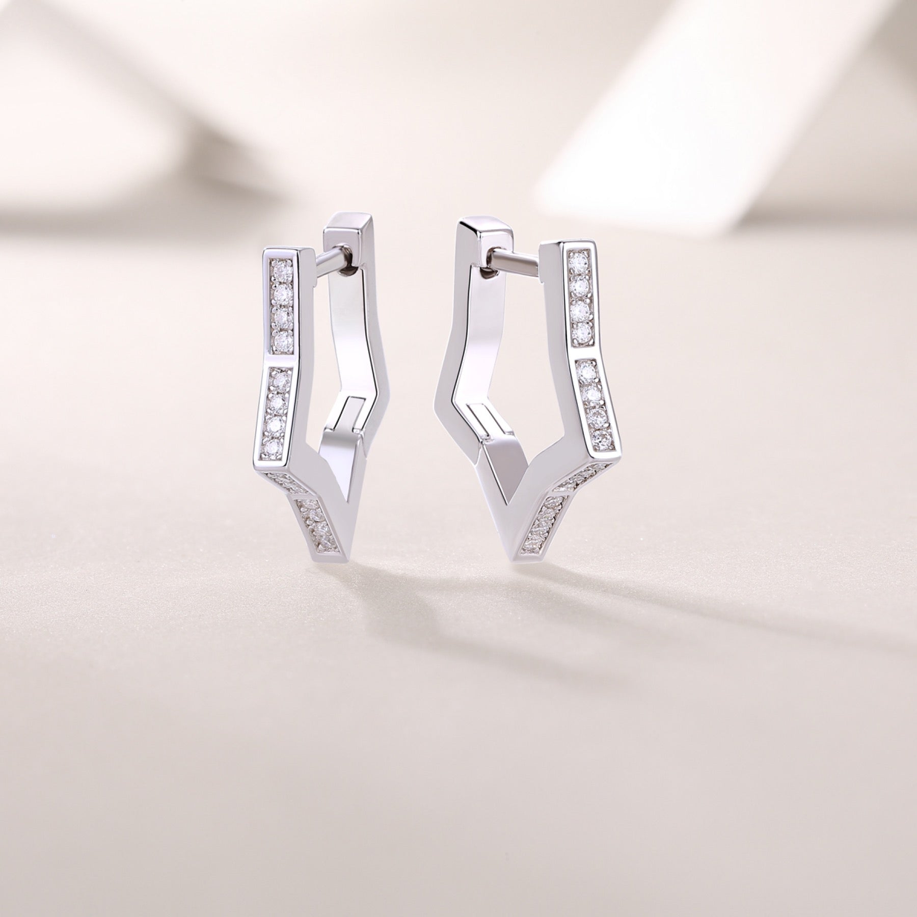 Vertex Moissanite Huggie Hoop Earrings in Sterling Silver