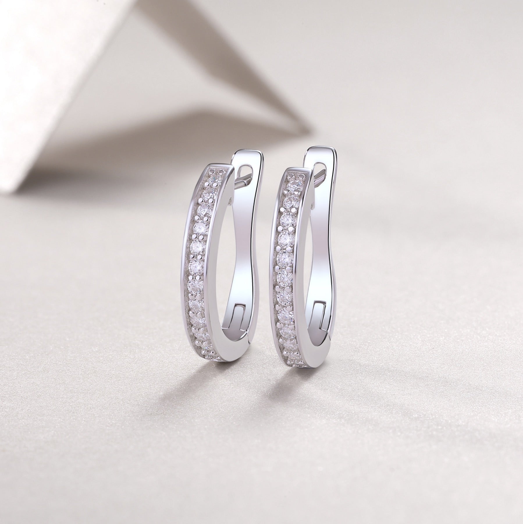 Sleek Moissanite Huggie Hoop Earrings in Sterling Silver