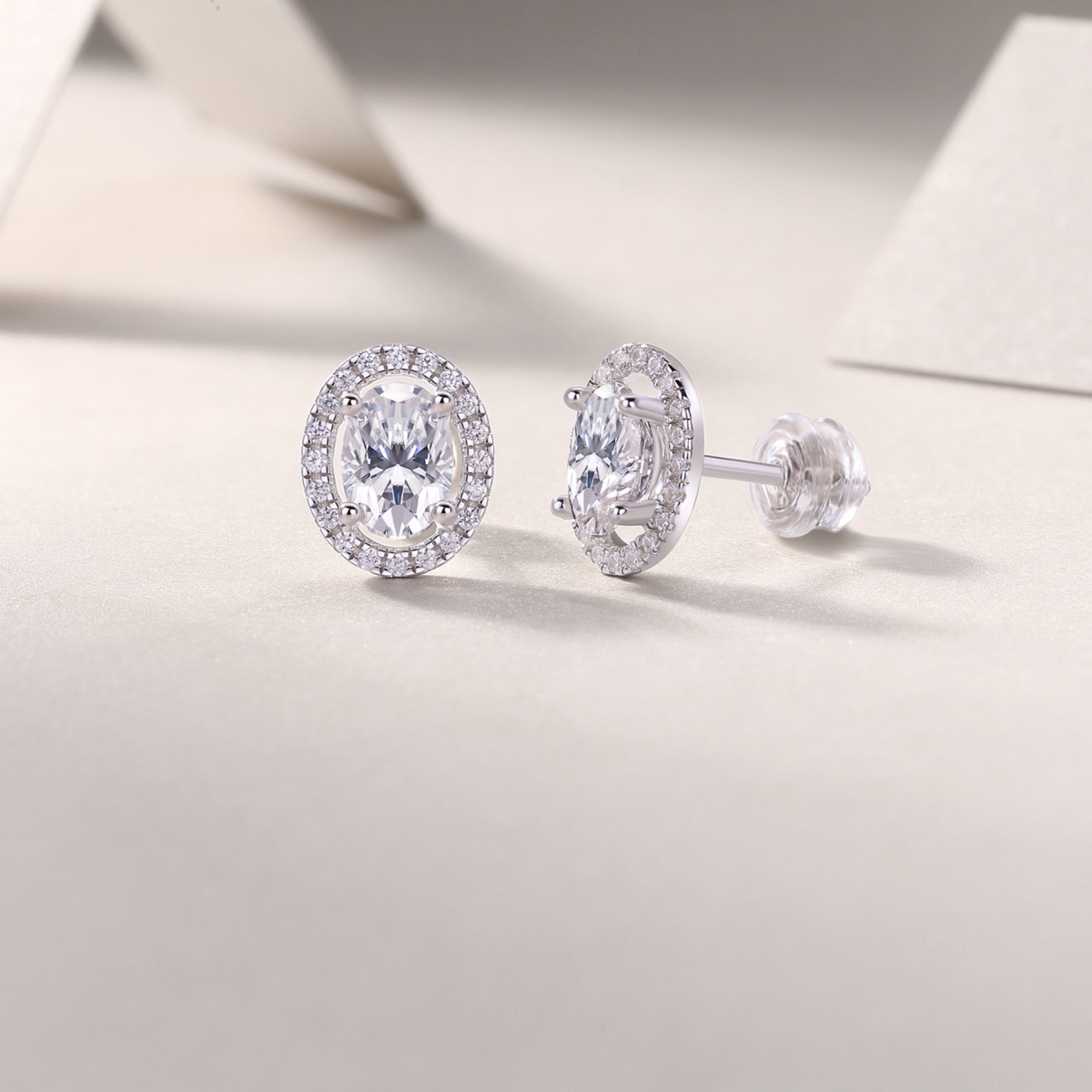 Ovation Moissanite Oval Halo Stud Earrings in Sterling Silver