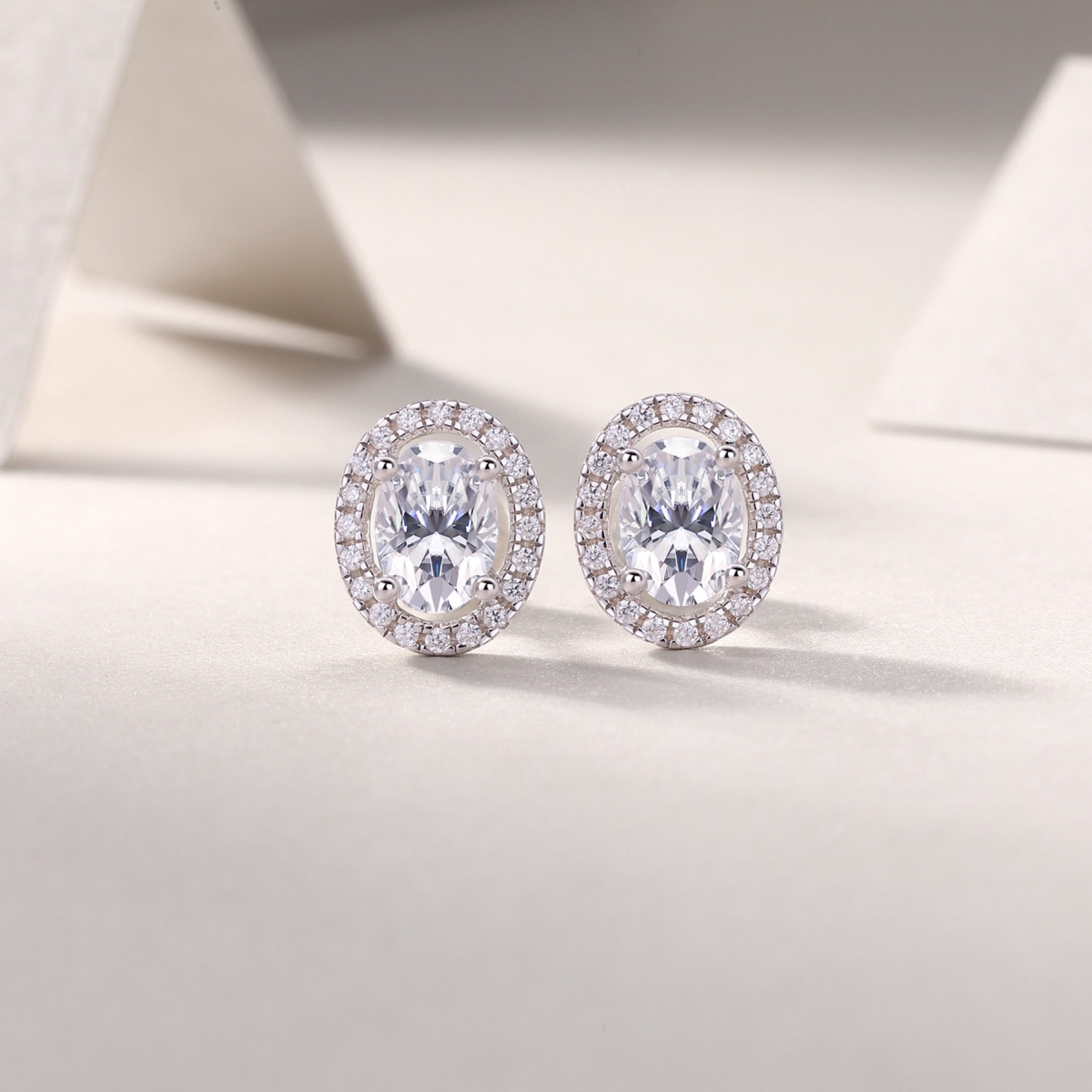 Ovation Moissanite Oval Halo Stud Earrings in Sterling Silver