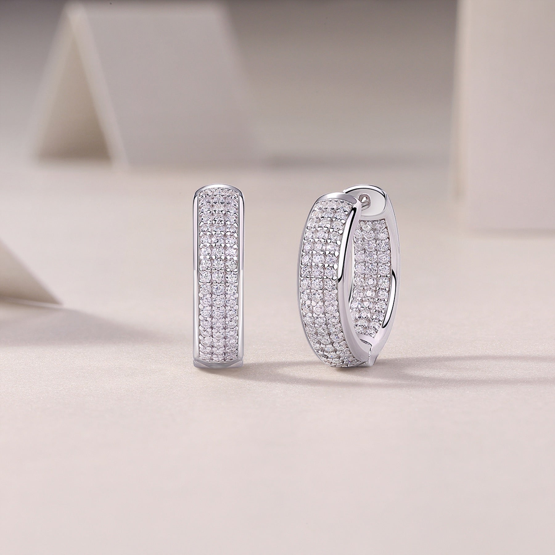 Magnum Moissanite Huggie Hoop Earrings in Sterling Silver