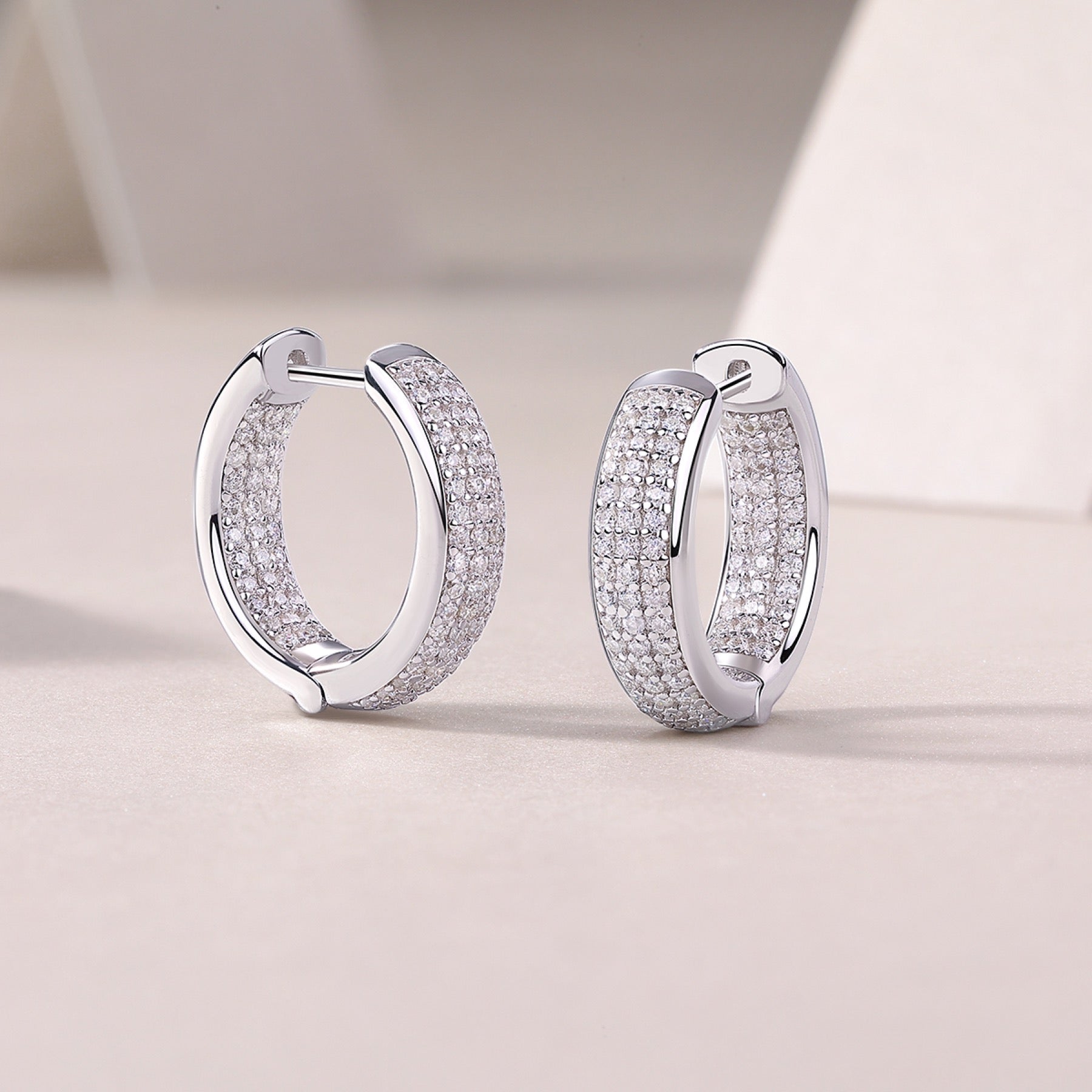 Magnum Moissanite Huggie Hoop Earrings in Sterling Silver