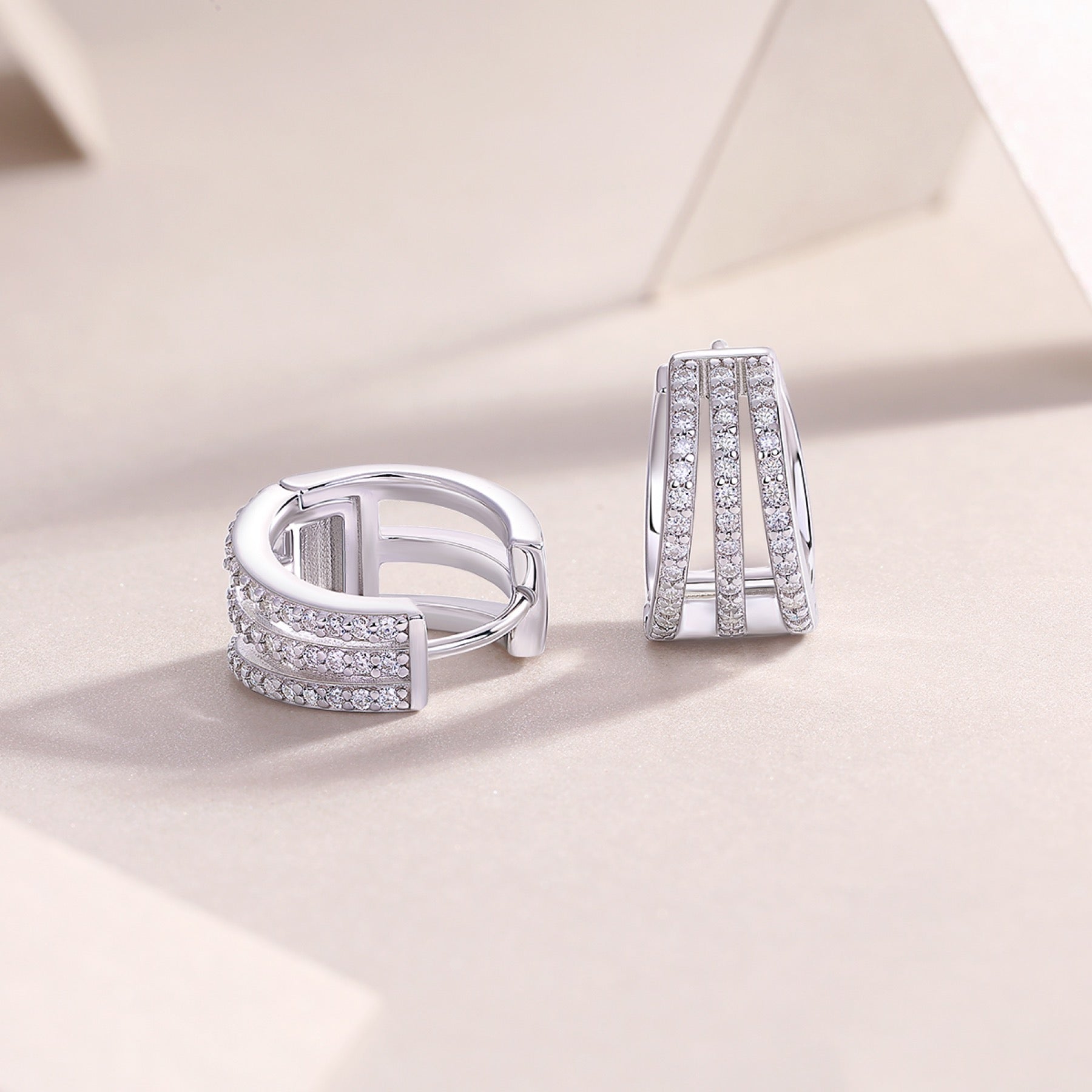 Cleave Moissanite Huggie Hoop Earrings in Sterling Silver