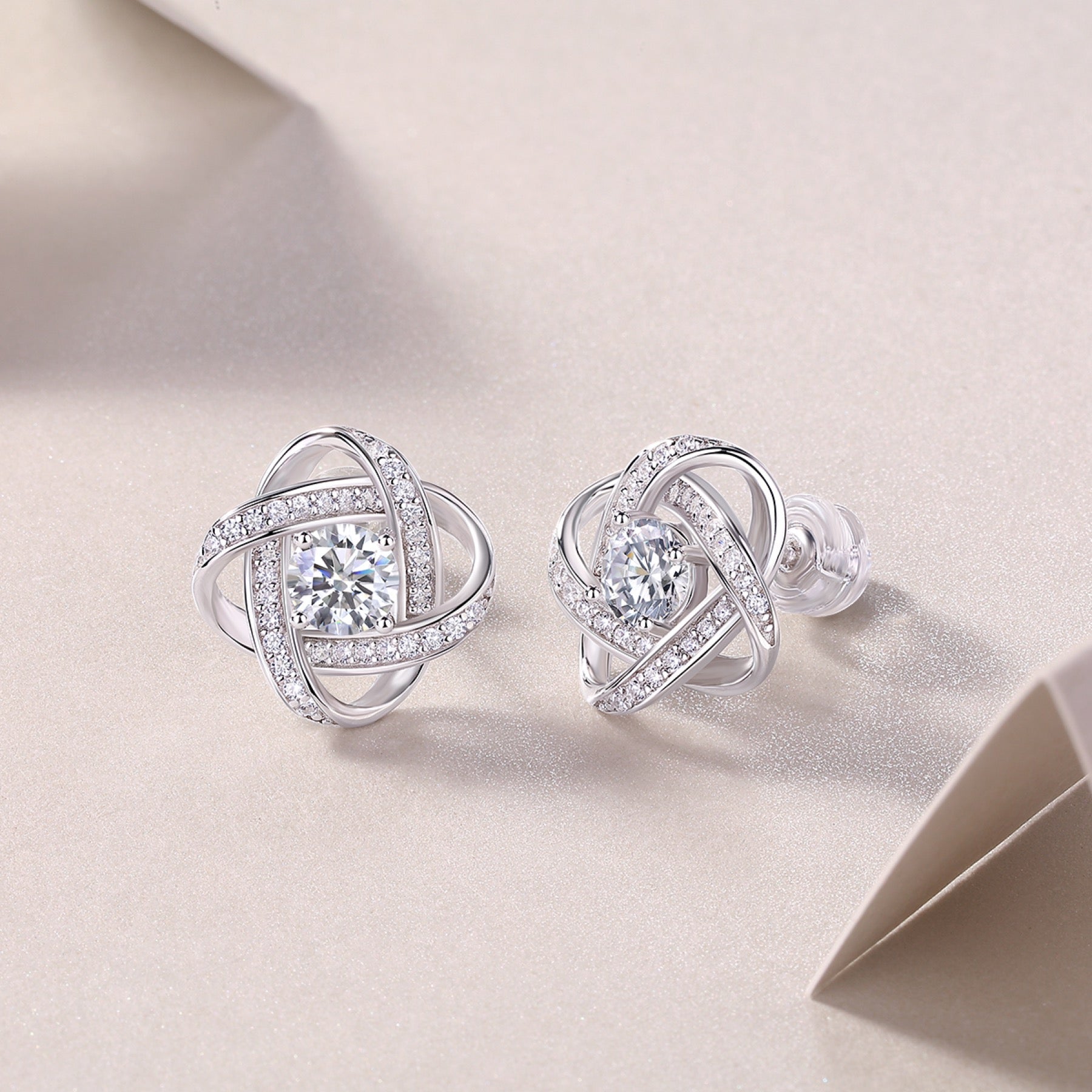 Amity Moissanite Love Knot Stud Earrings in Sterling Silver