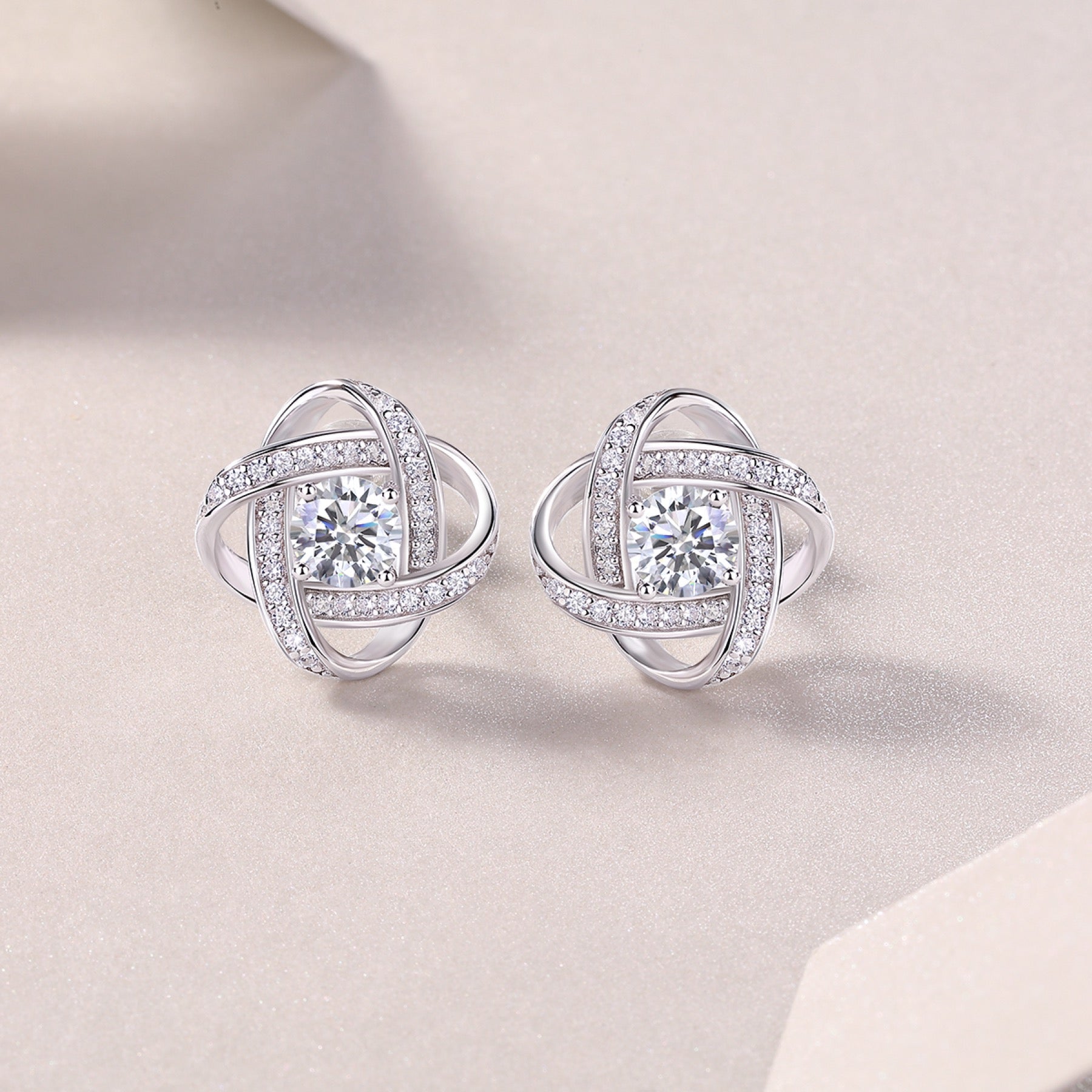 Amity Moissanite Love Knot Stud Earrings in Sterling Silver