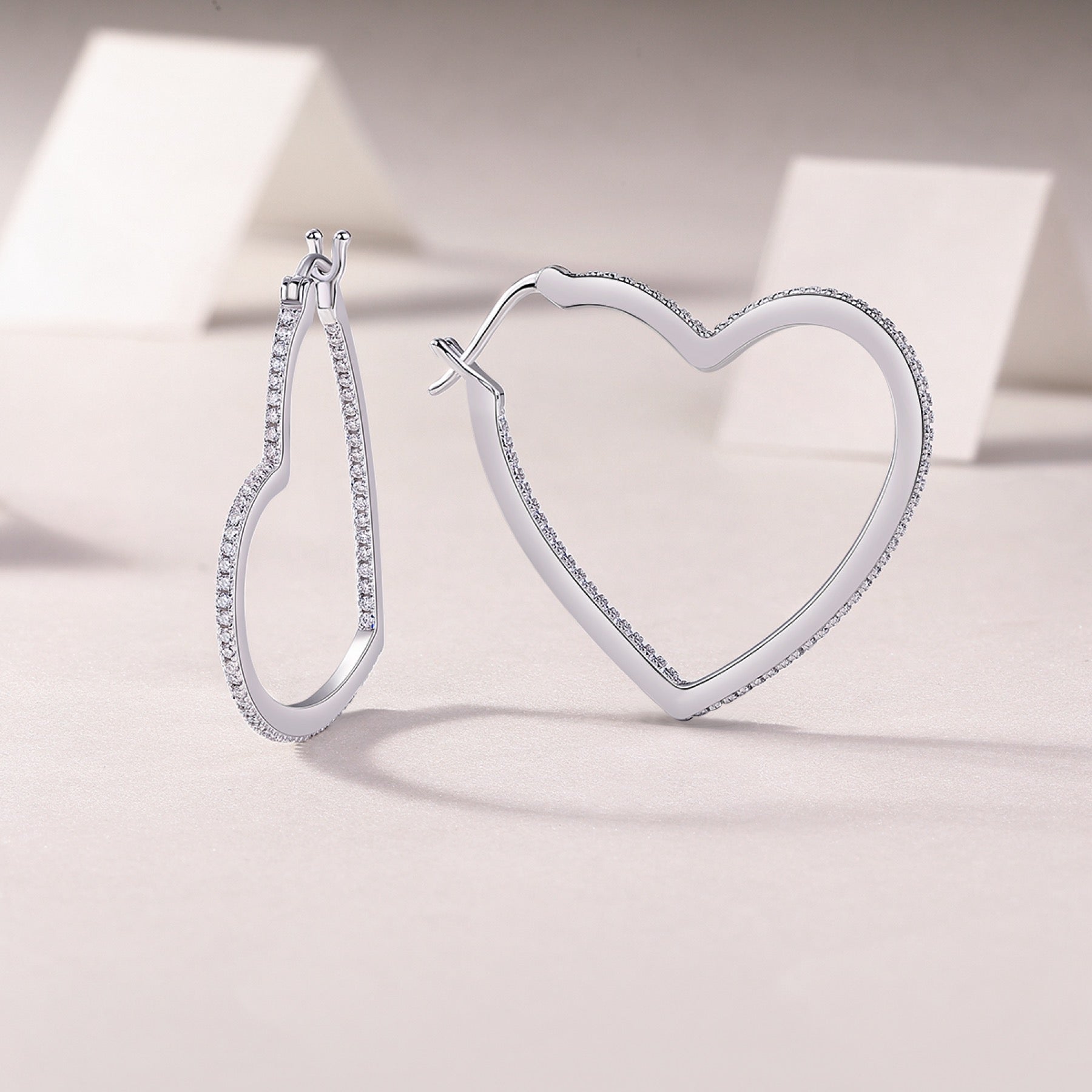 Fondant Moissanite Heart Hoop Earrings in Sterling Silver