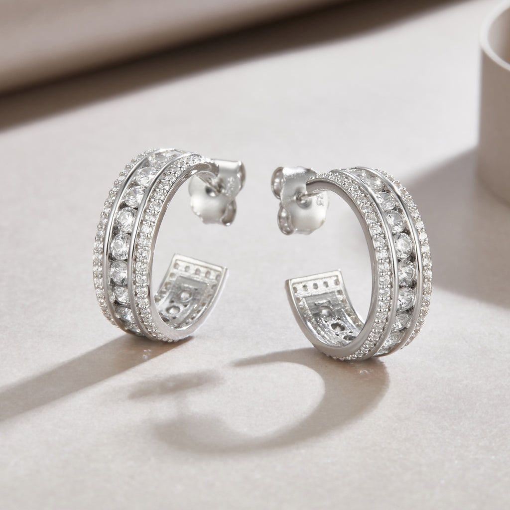 Treble Moissanite Huggie Hoop Earrings in Sterling Silver