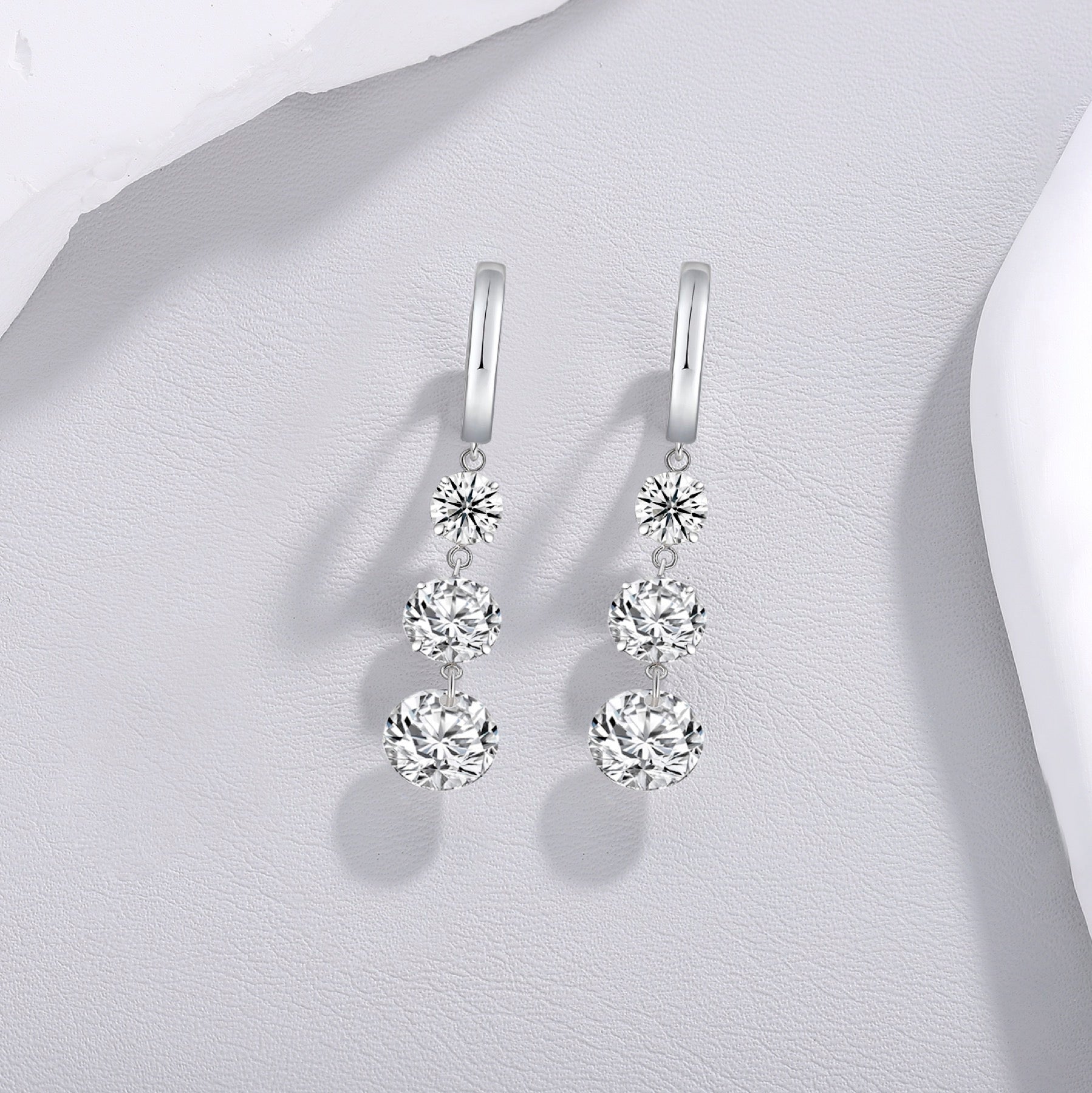 Triplet Moissanite Three-Stone Drop Earrings in Sterling Silver