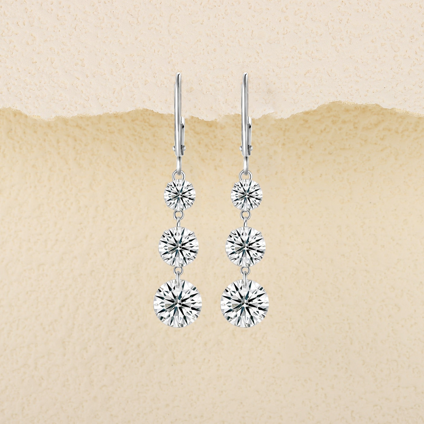 Graduate Moissanite Three-Stone Drop Earrings in Sterling Silver