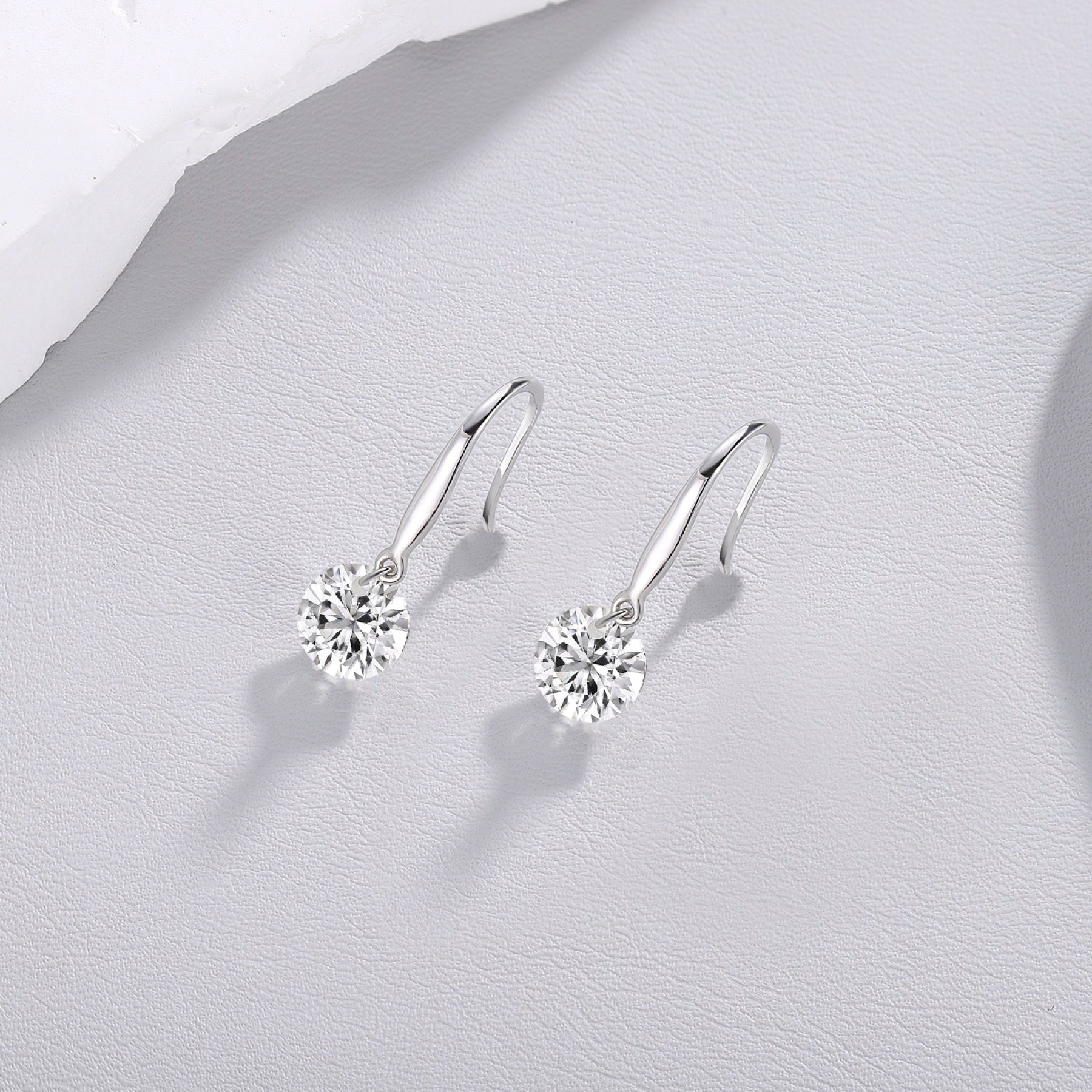 Rivulet Moissanite Three-Stone Drop Earrings in Sterling Silver